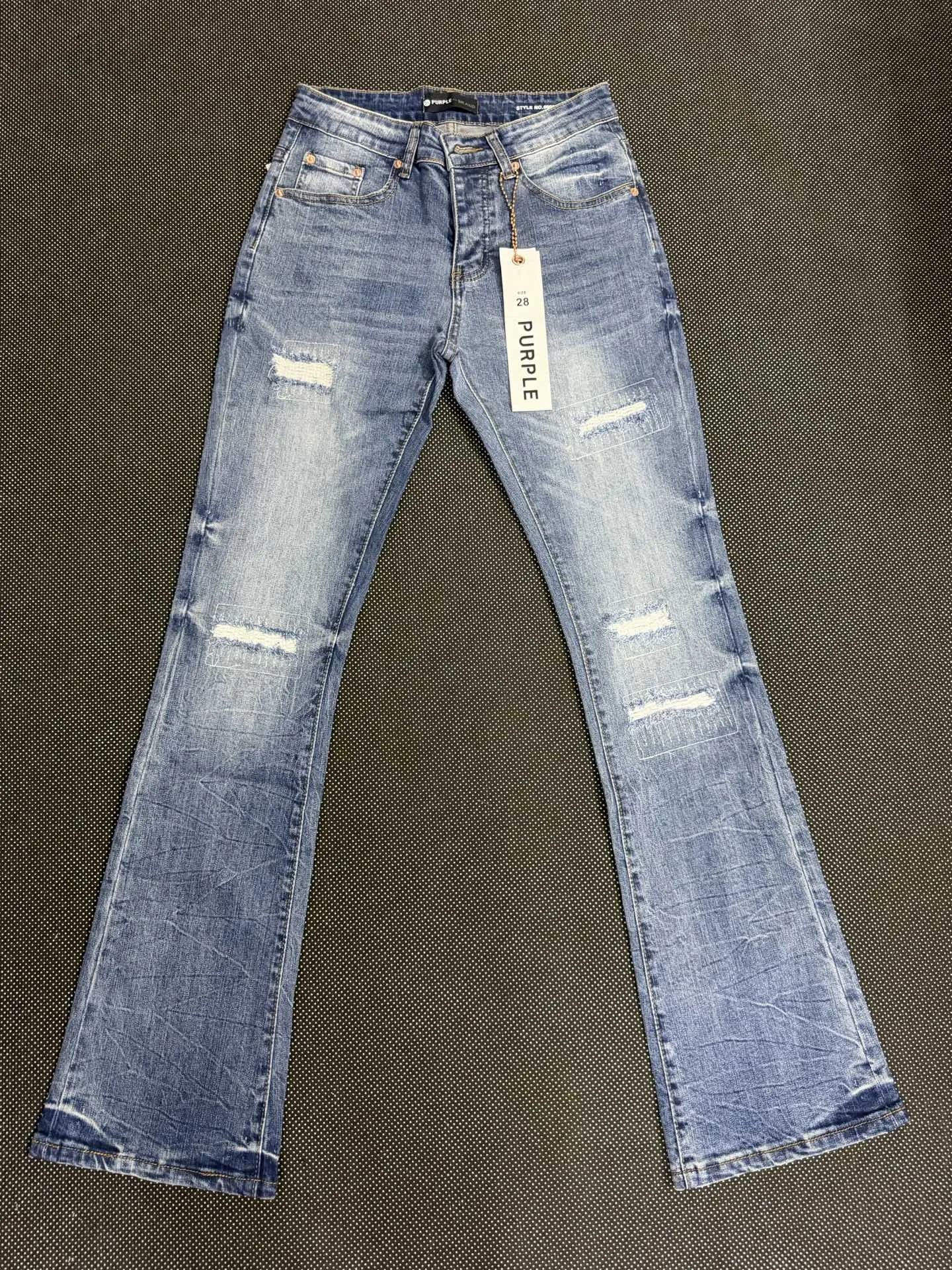 Distressed Bootcut Jeans with Patchwork Detail D19021842