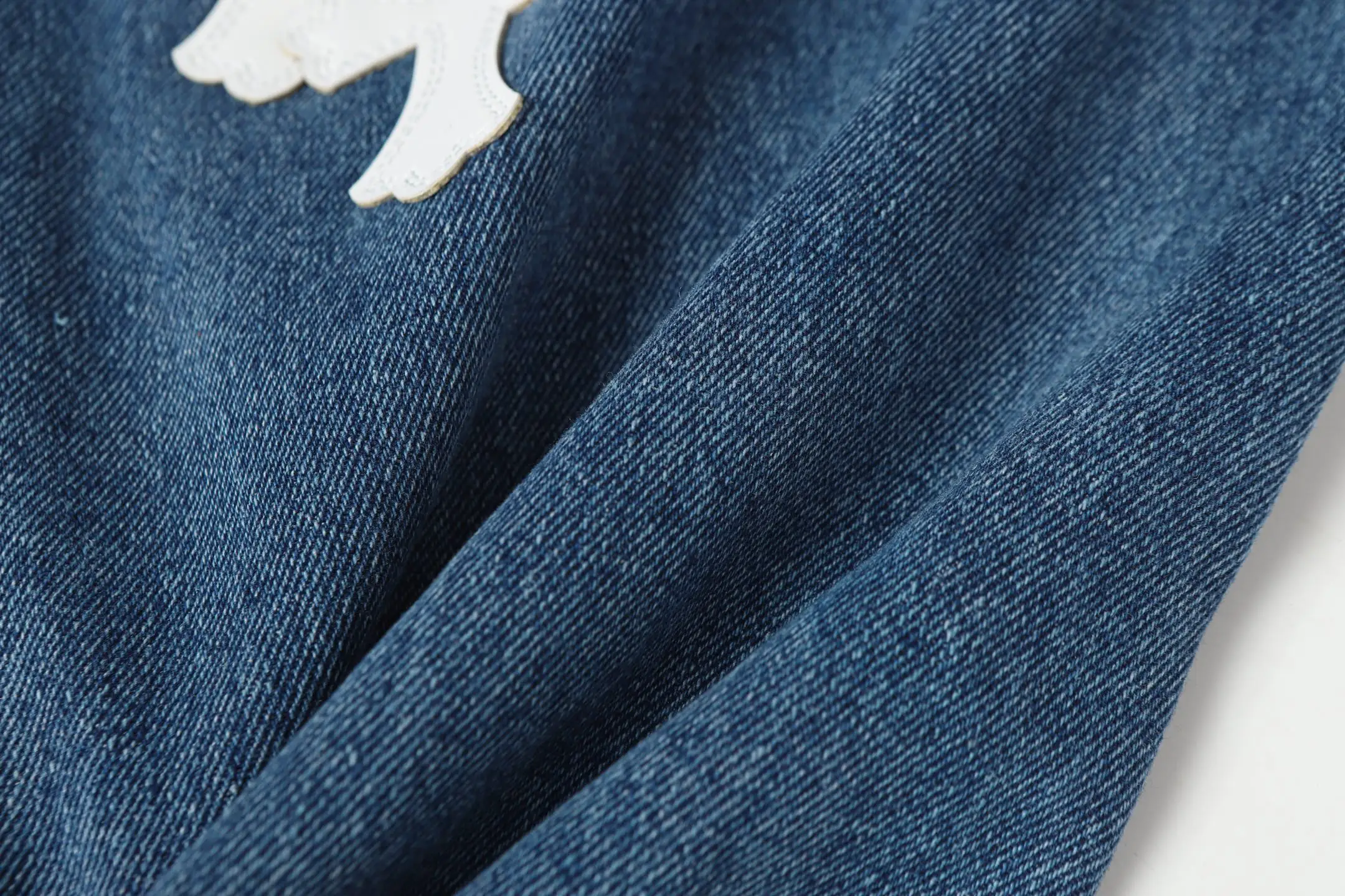 Cross-Patch Appliqué Straight-Leg Jeans D15513474 — view 15
