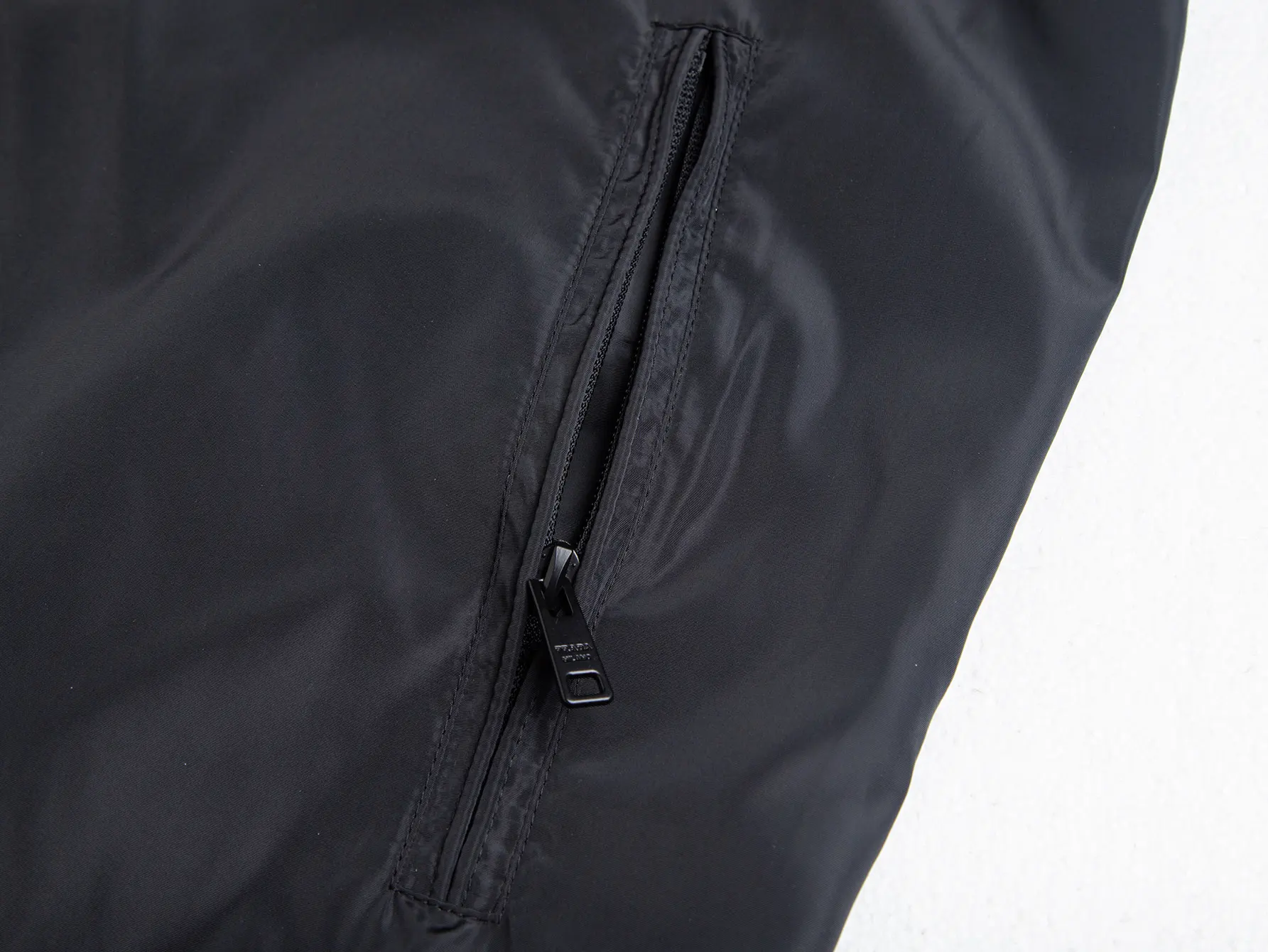 Triangle Logo Hooded Windbreaker Jacket D32520441 — view 9