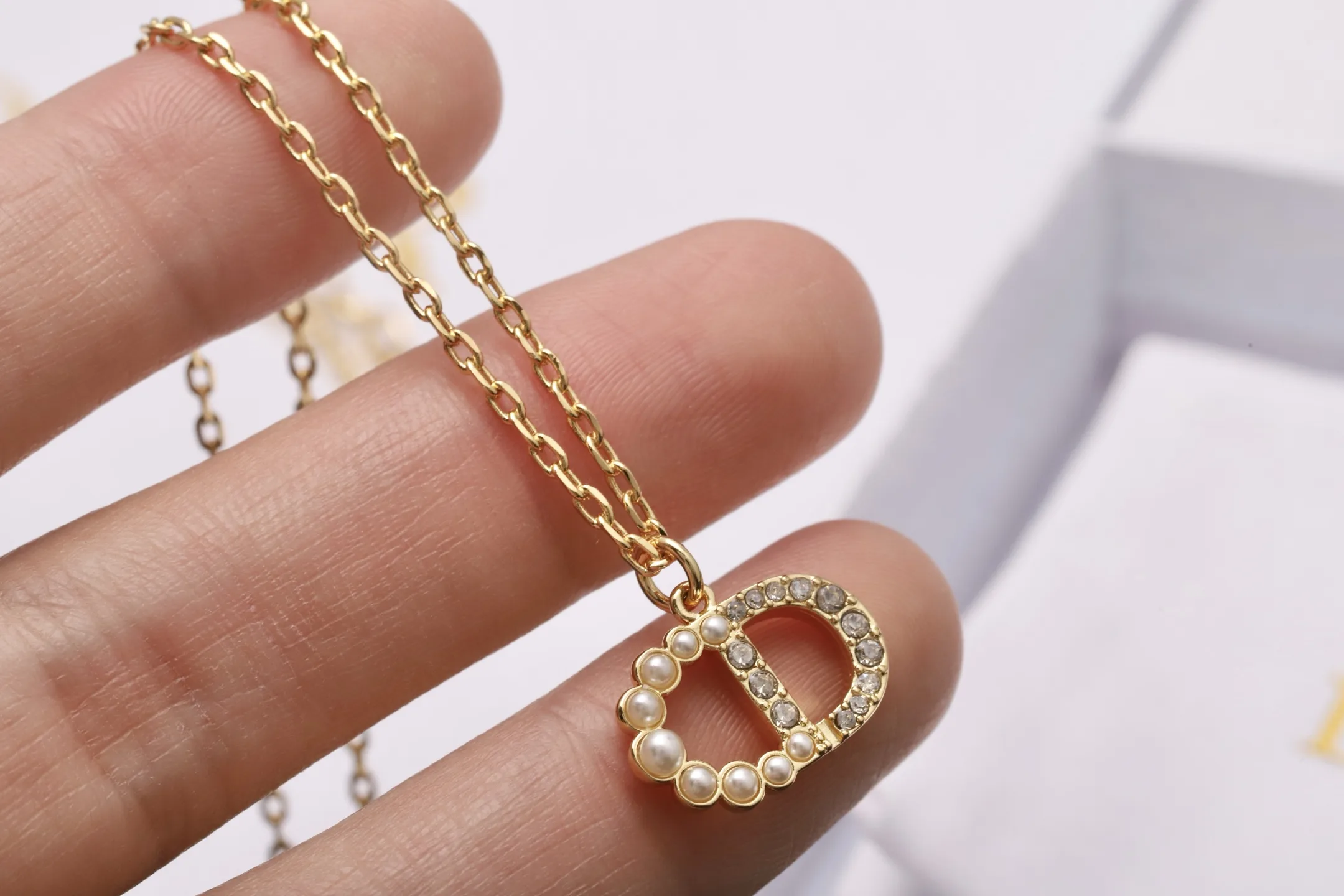 CD Logo Crystal and Resin Pearl Necklace D14017217 — view 4