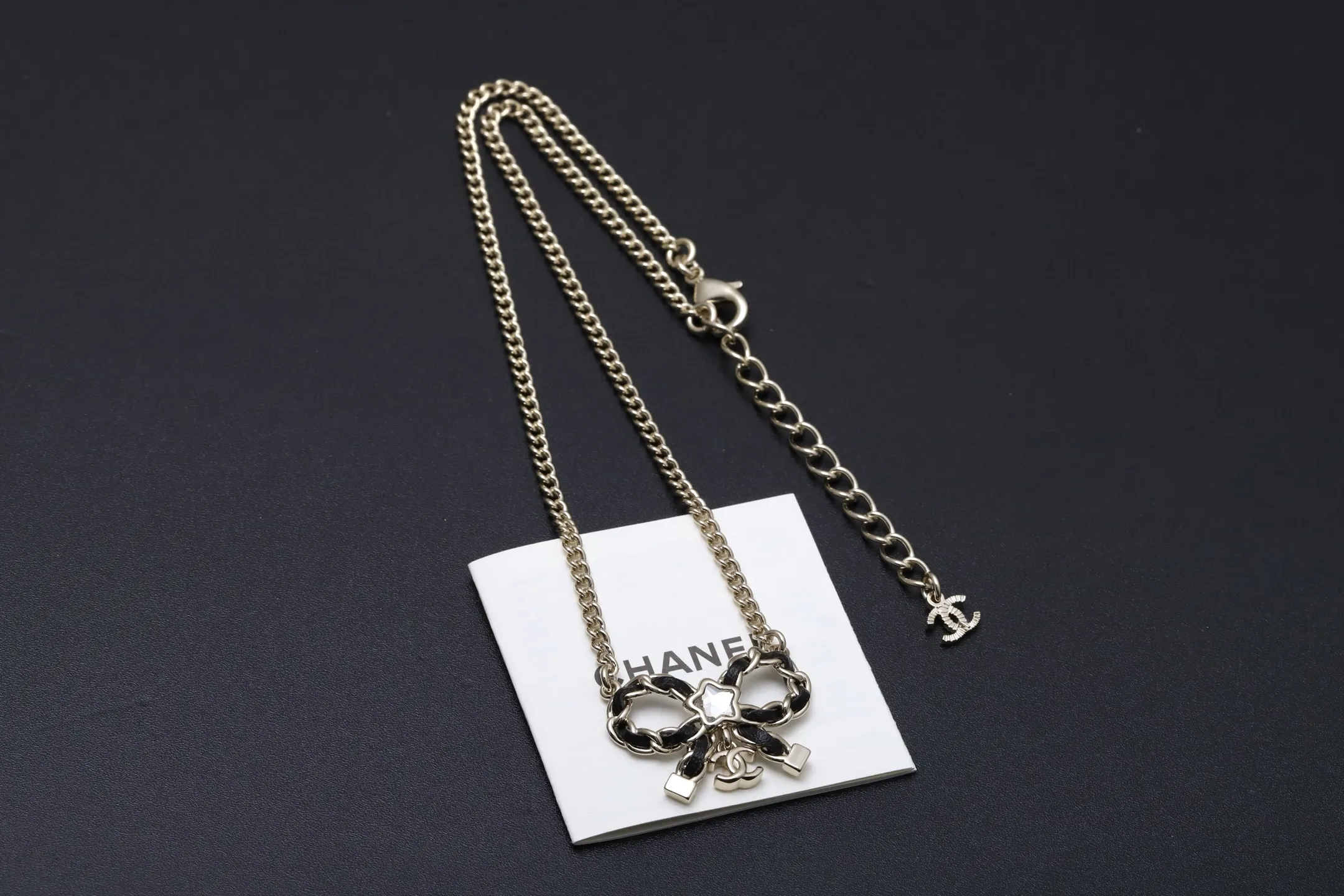 Bow Pendant Necklace with Leather Chain Detail D14017304 — view 3