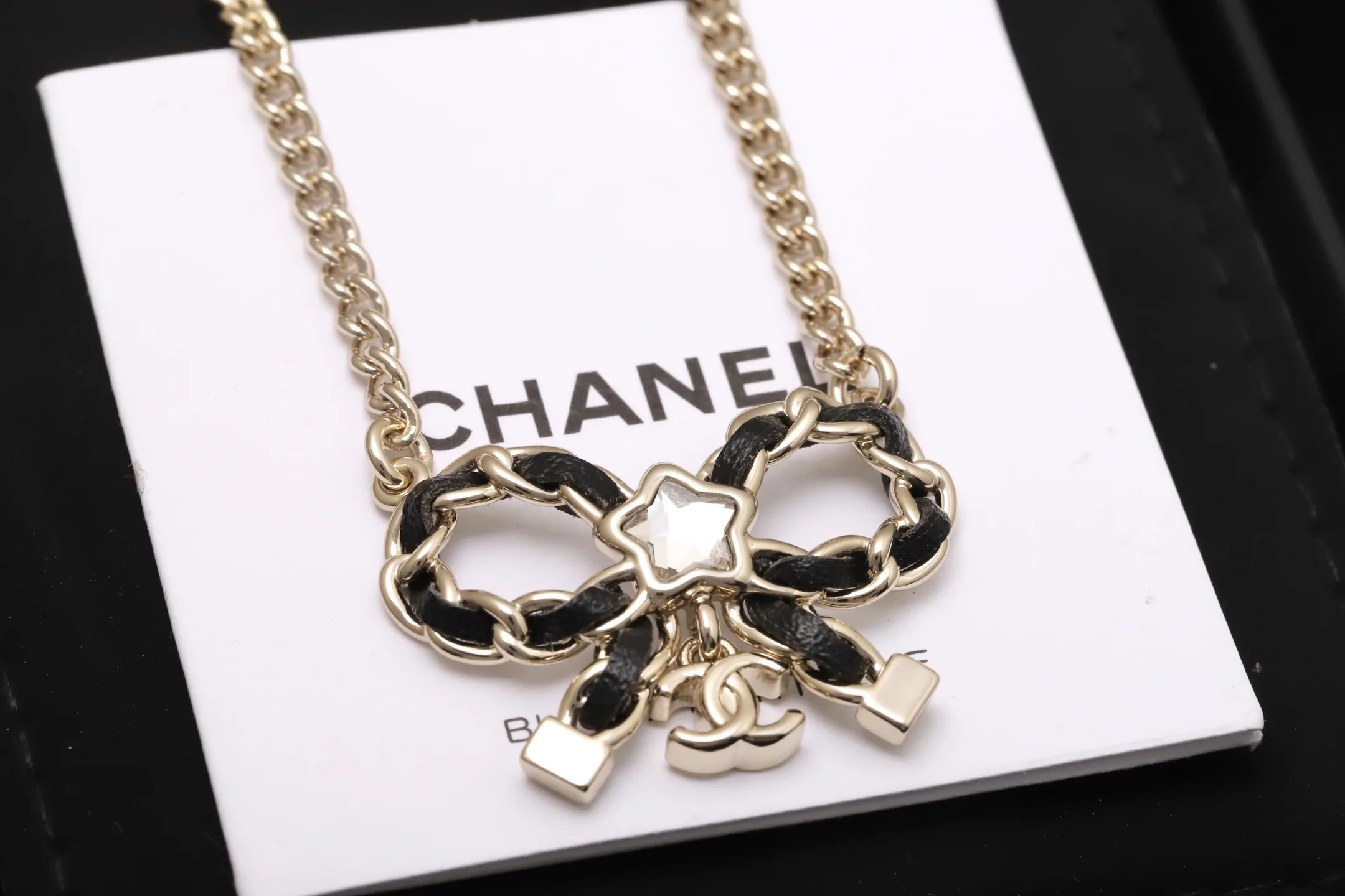 Bow Pendant Necklace with Leather Chain Detail D14017304 — view 7
