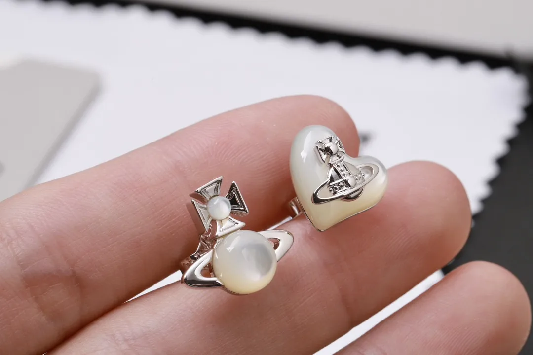 Mother-of-Pearl Heart and Saturn Stud Earrings D15516981 — view 5