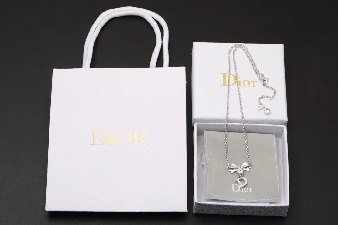 Vintage Bow and Crystal Logo Pendant Necklace D13516765