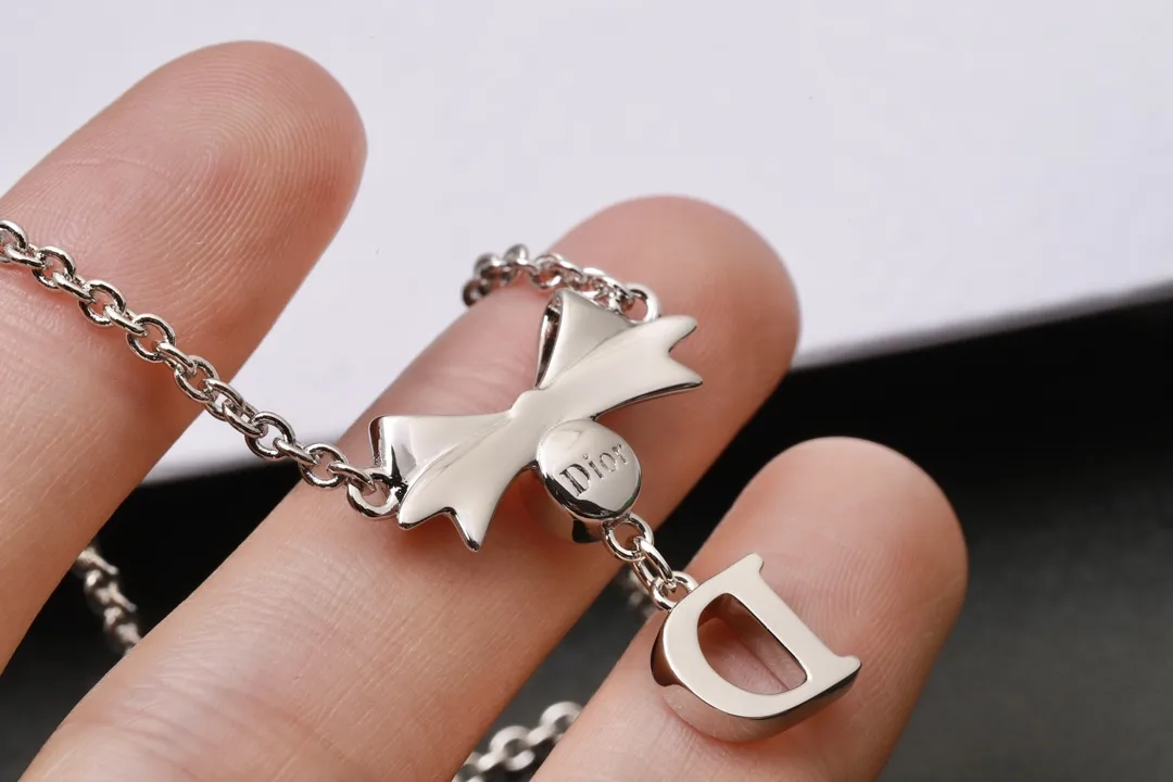 Vintage Bow and Crystal Logo Pendant Necklace D13516765 — view 5