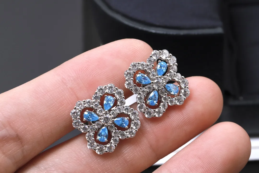 Diamond Loop Floral Stud Earrings (Sterling Silver) D32516615 — view 5