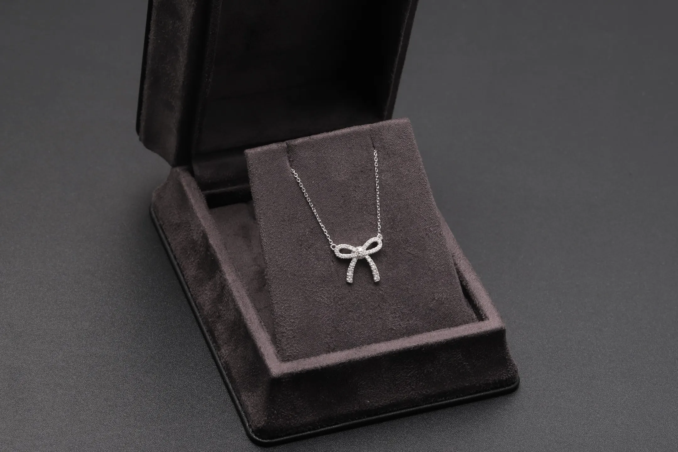 Moissanite Bow Pendant Necklace (Sterling Silver) D21516917 — view 2
