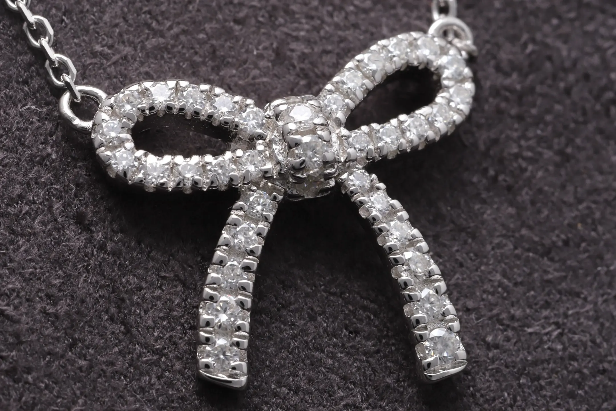 Moissanite Bow Pendant Necklace (Sterling Silver) D21516917 — view 3