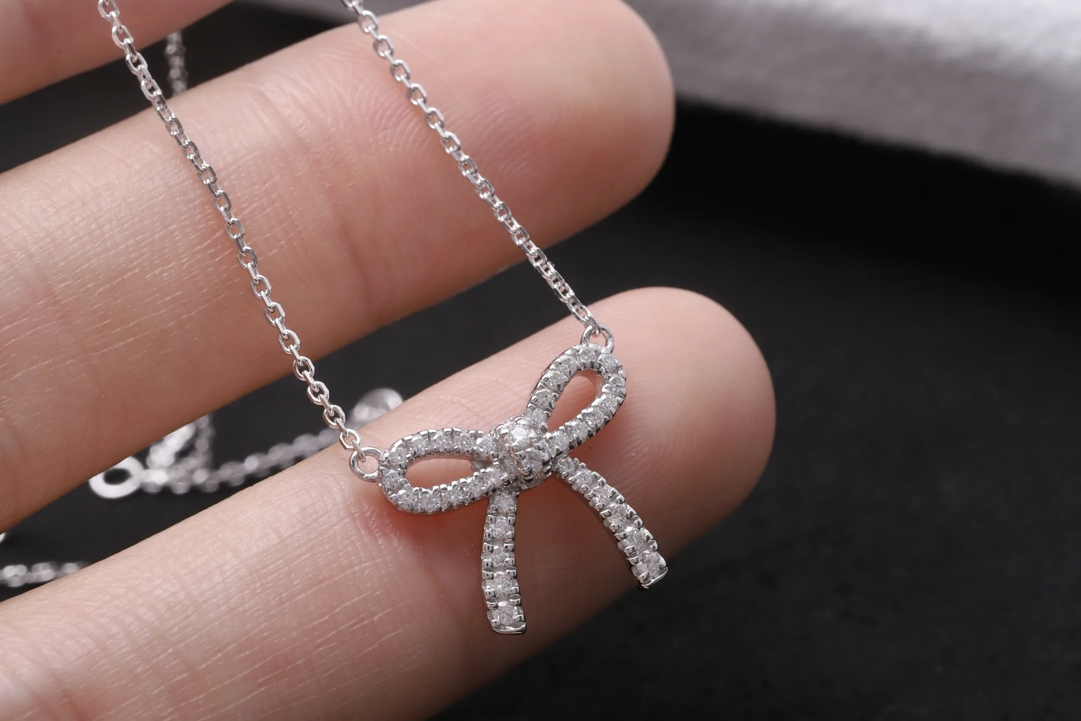Moissanite Bow Pendant Necklace (Sterling Silver) D21516917 — view 4