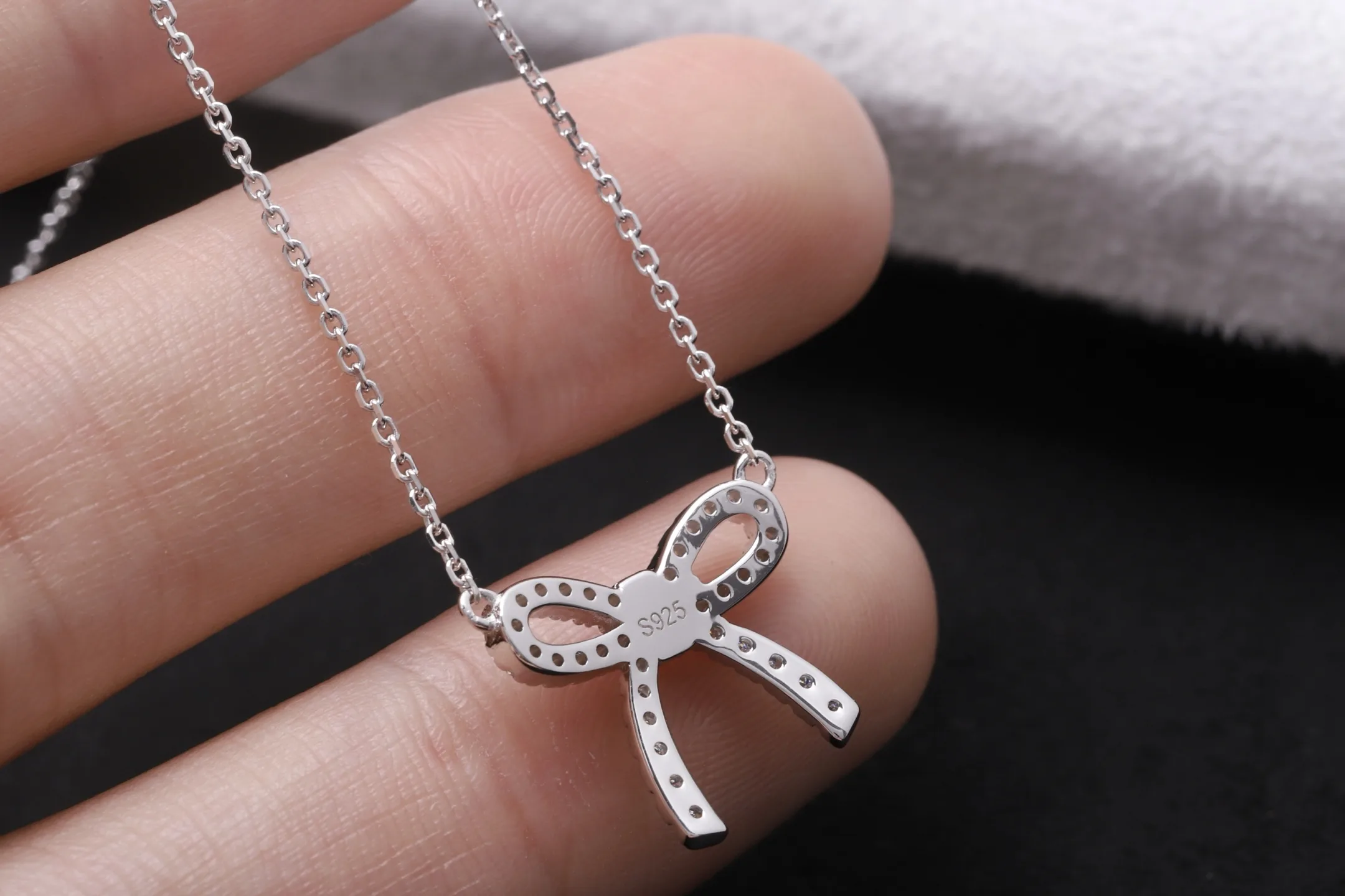 Moissanite Bow Pendant Necklace (Sterling Silver) D21516917 — view 5
