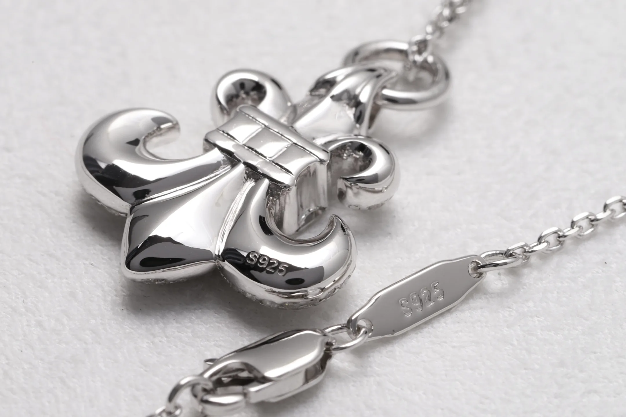 Fleur-de-Lis Moissanite Pendant Necklace (Sterling Silver) D50516951 — view 7