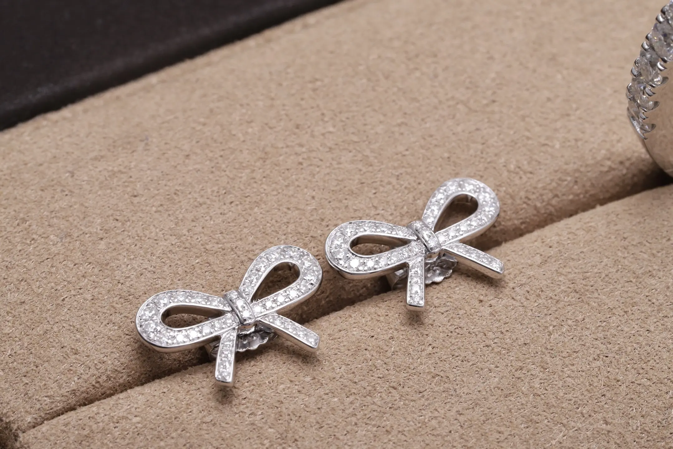 Moissanite Bow Stud Earrings (Sterling Silver) D22516697 — view 3