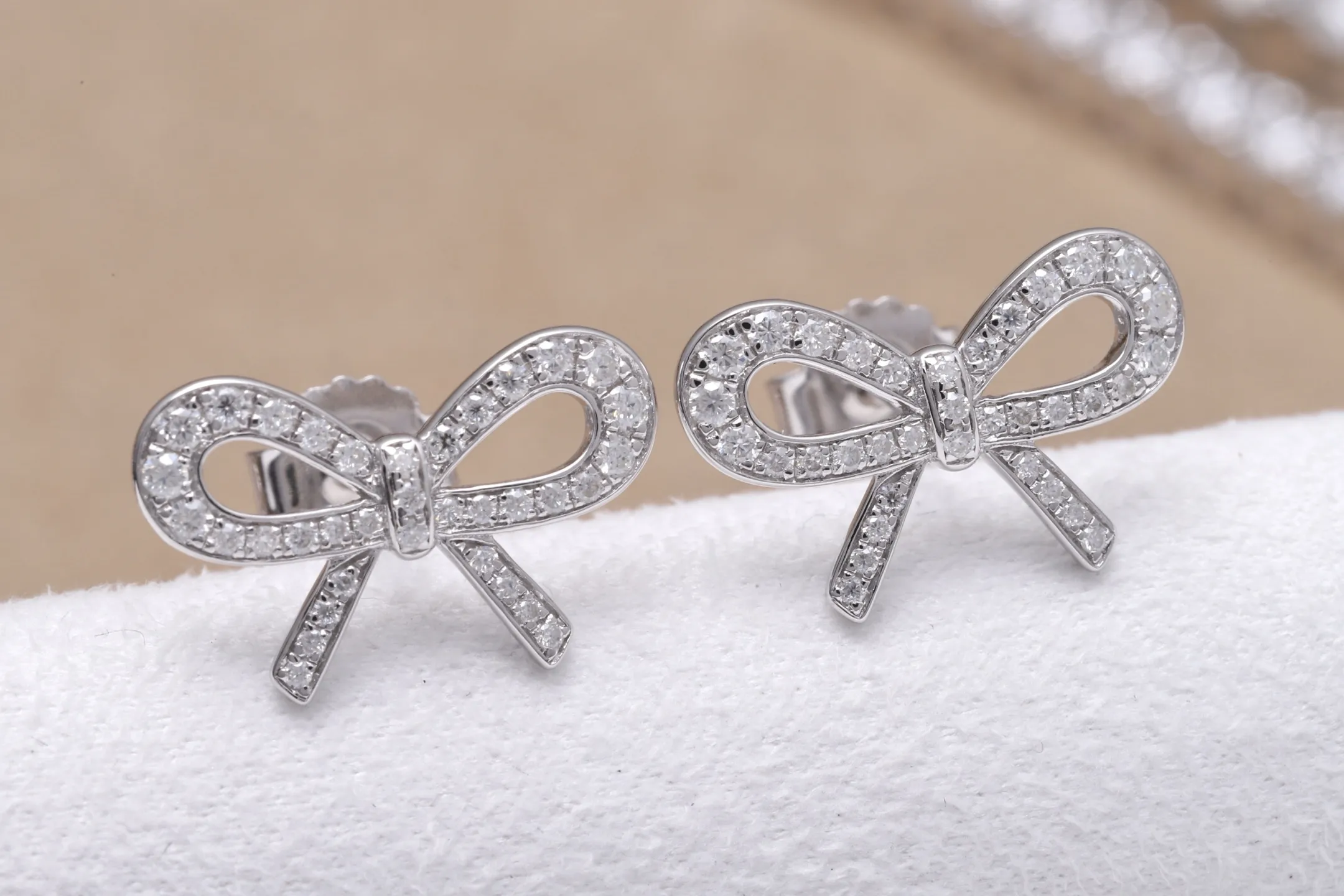 Moissanite Bow Stud Earrings (Sterling Silver) D22516697 — view 4