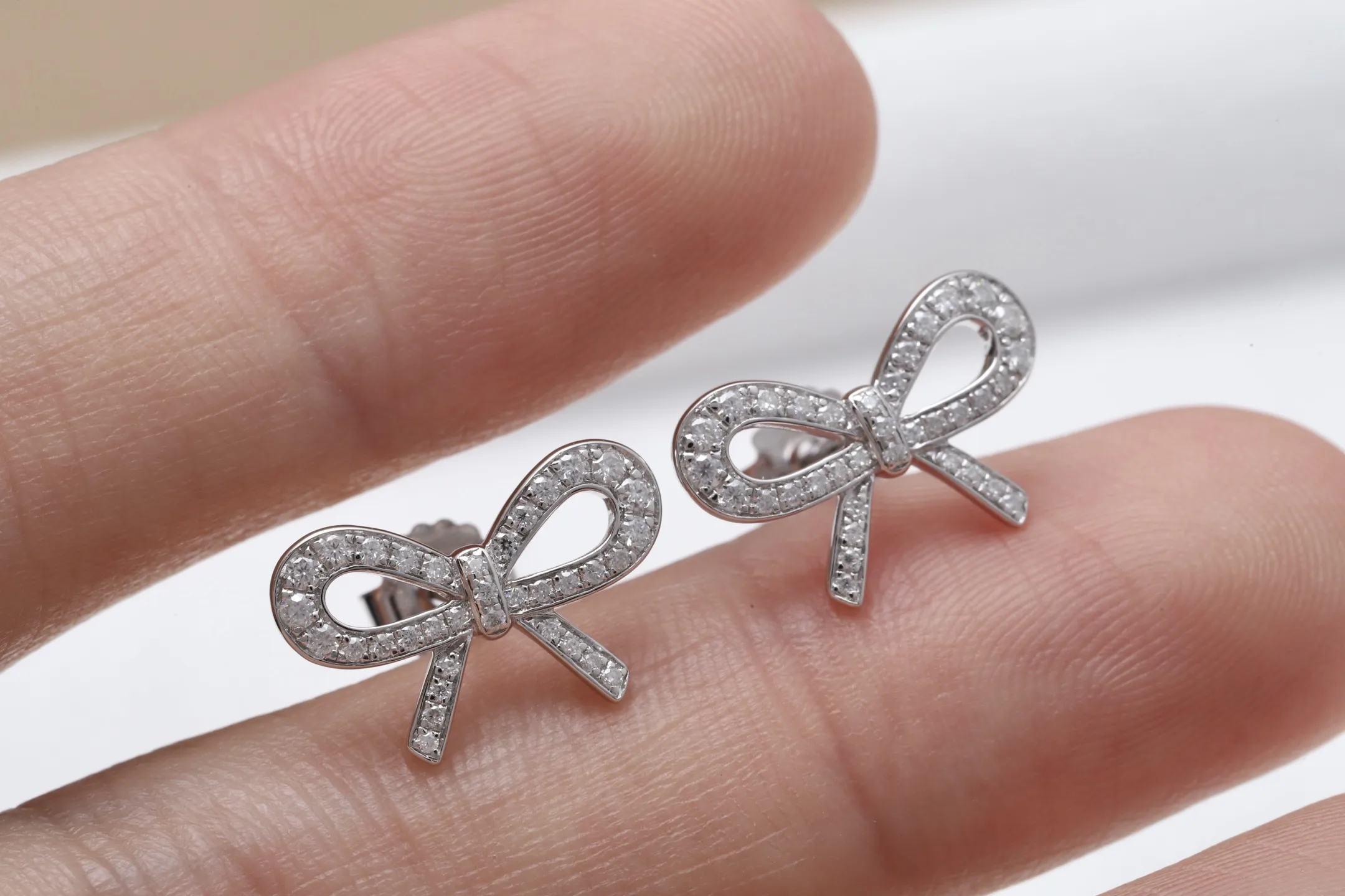 Moissanite Bow Stud Earrings (Sterling Silver) D22516697 — view 5