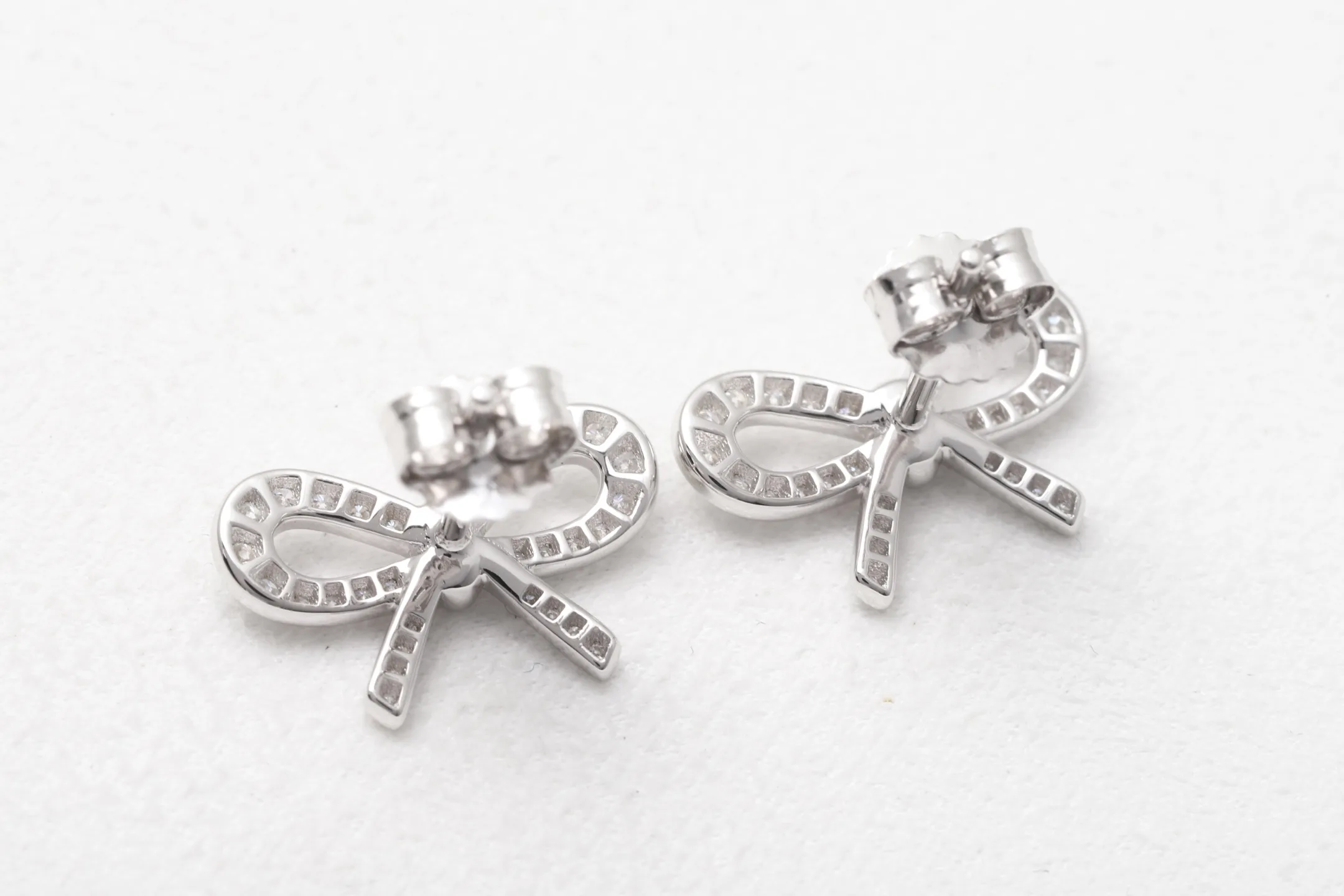 Moissanite Bow Stud Earrings (Sterling Silver) D22516697 — view 6