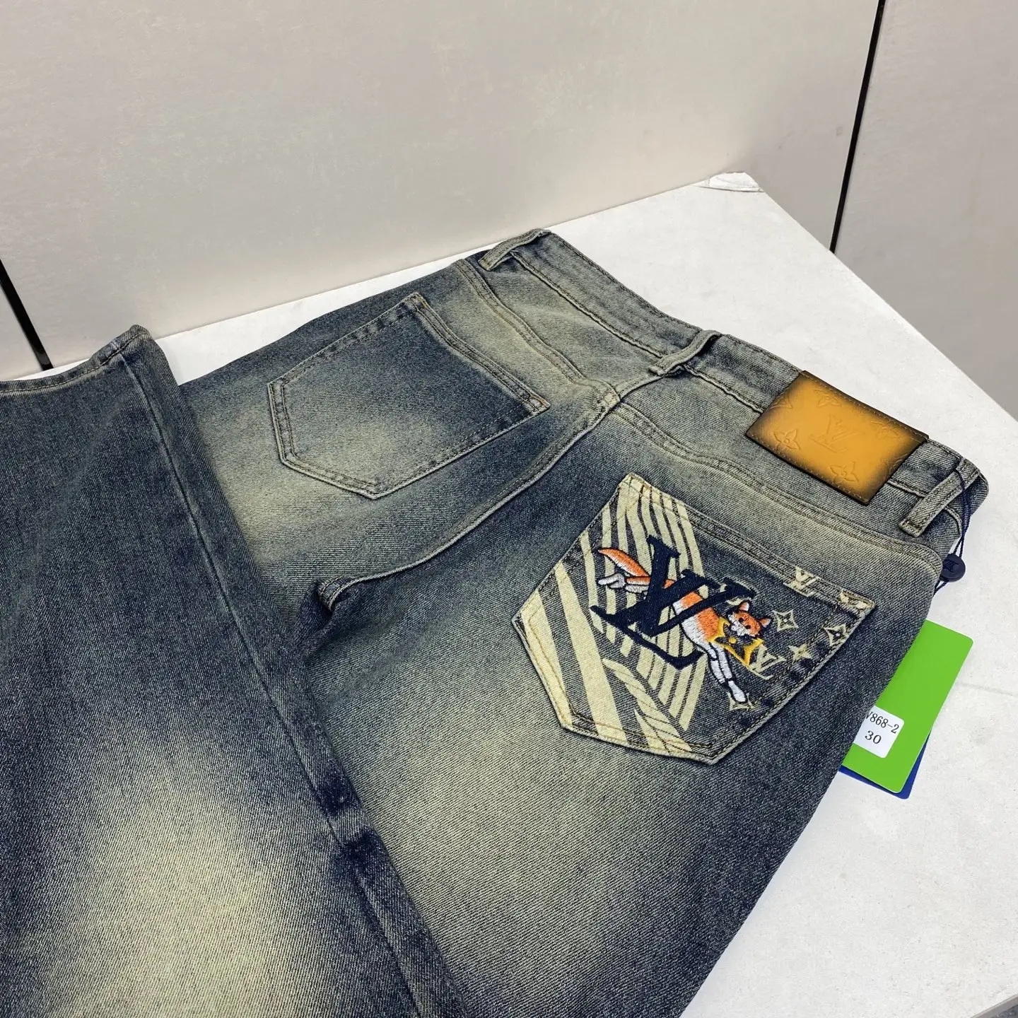 Slim-Fit Washed Denim Jeans with Fox Embroidery D17522599 — view 2