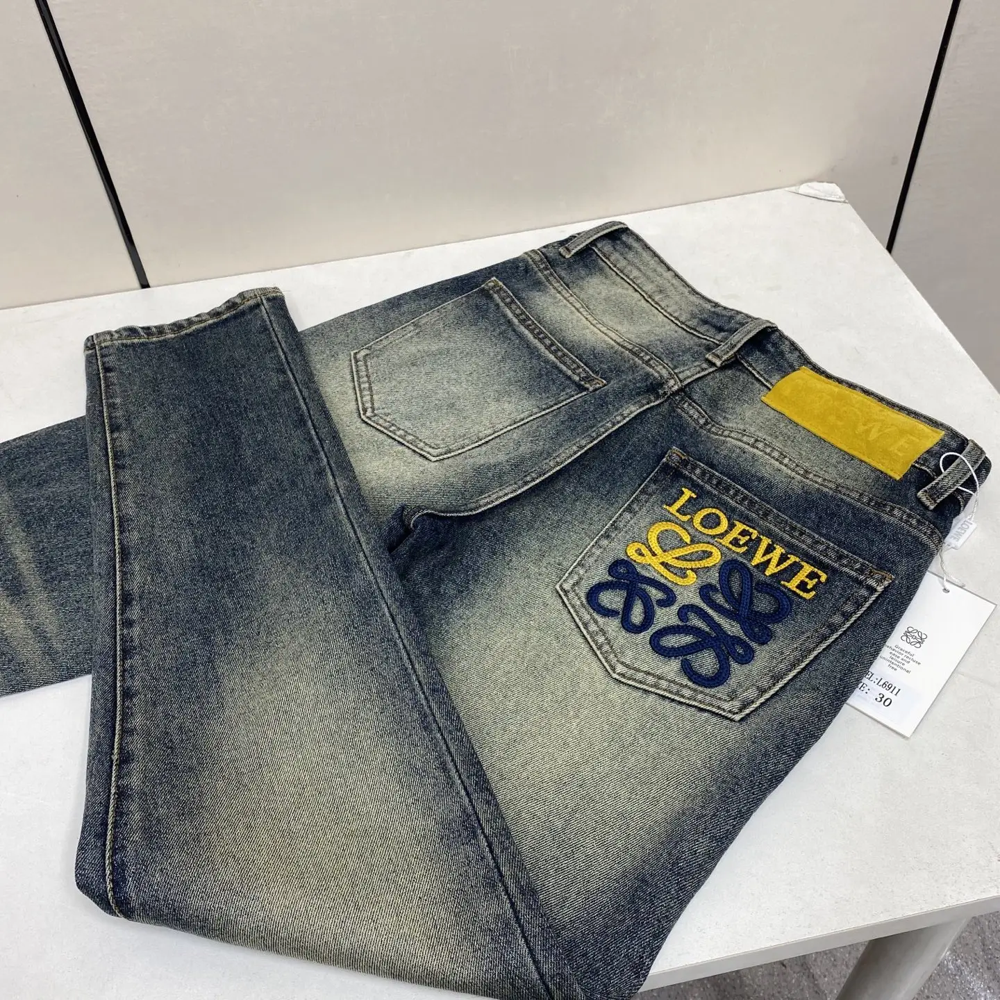 Anagram Embroidered Slim-Straight Jeans D17522585 — view 2