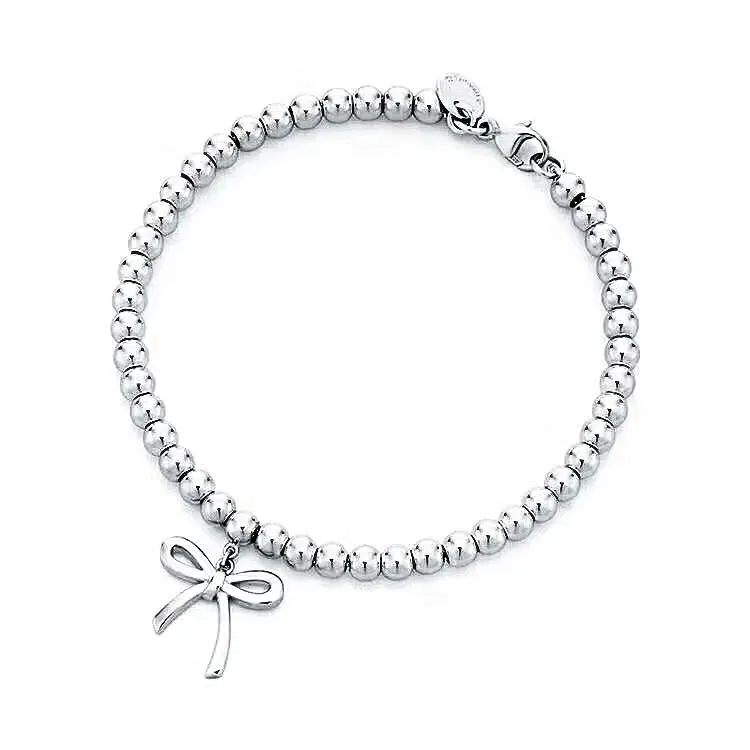 Beaded Bow Charm Bracelet (Sterling Silver) D29517005