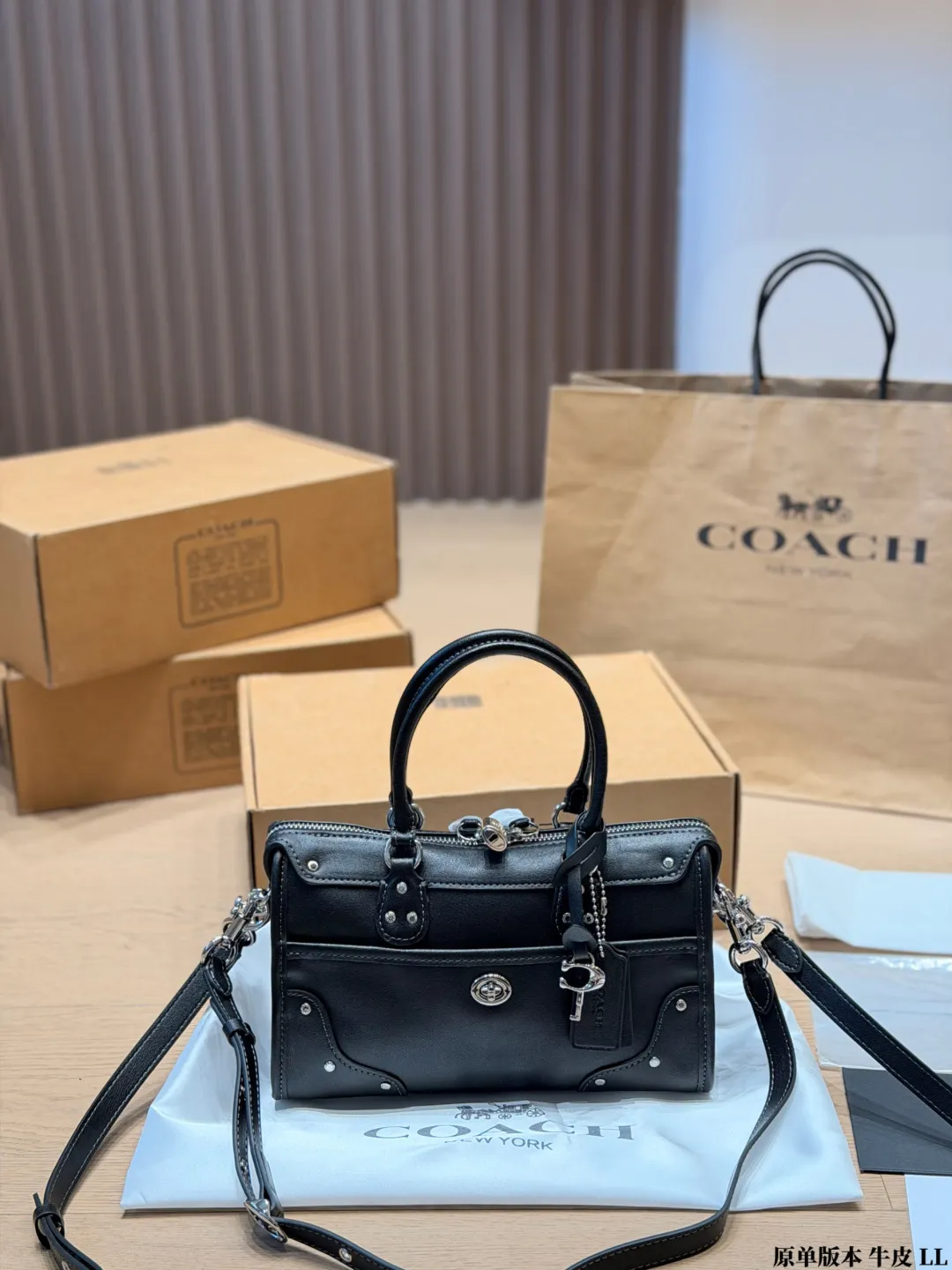Coach Rhyder 24 Leather Top-Handle Bag D33018282