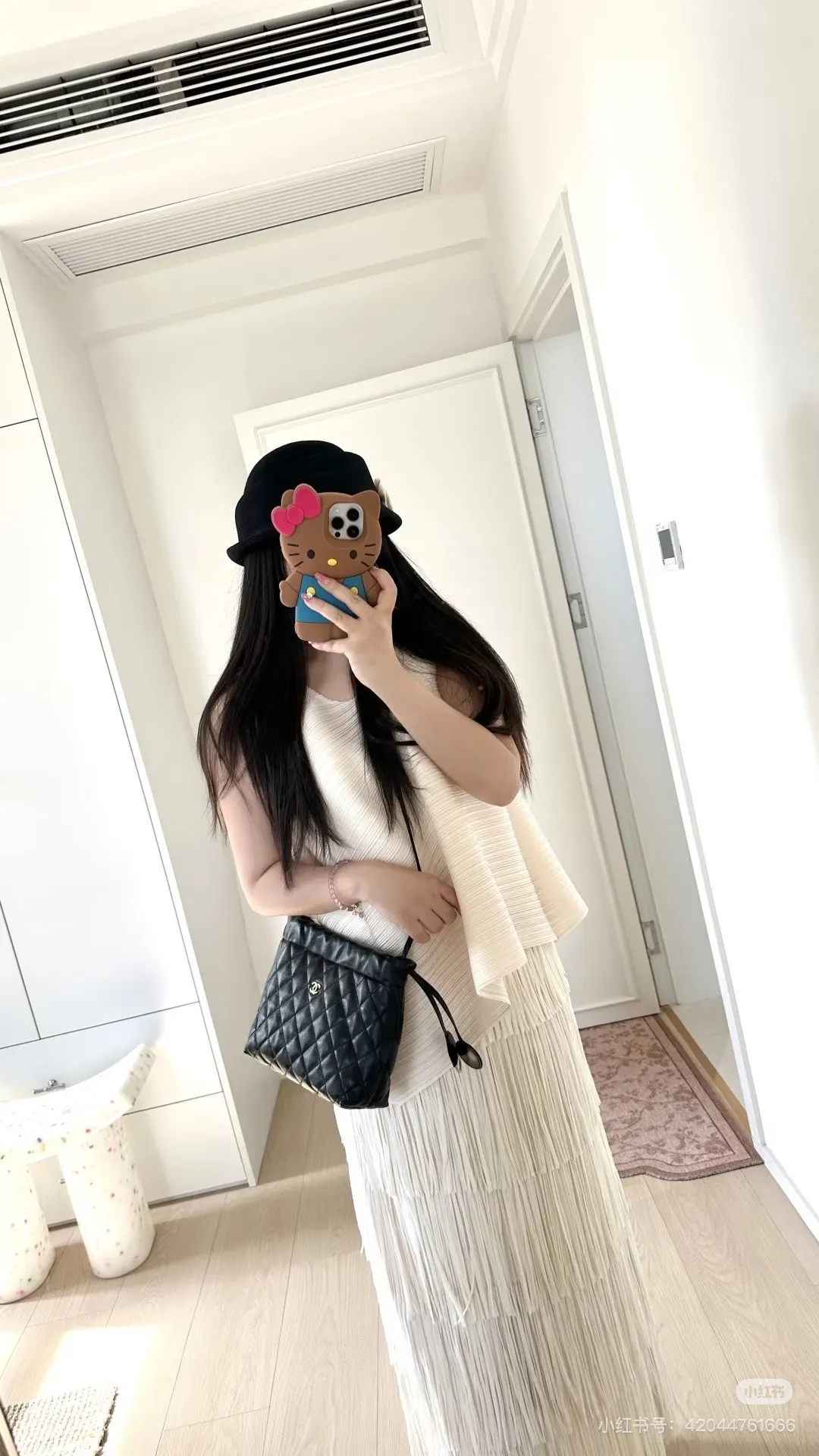 Quilted Leather Drawstring Bucket Bag D38018281 — view 2