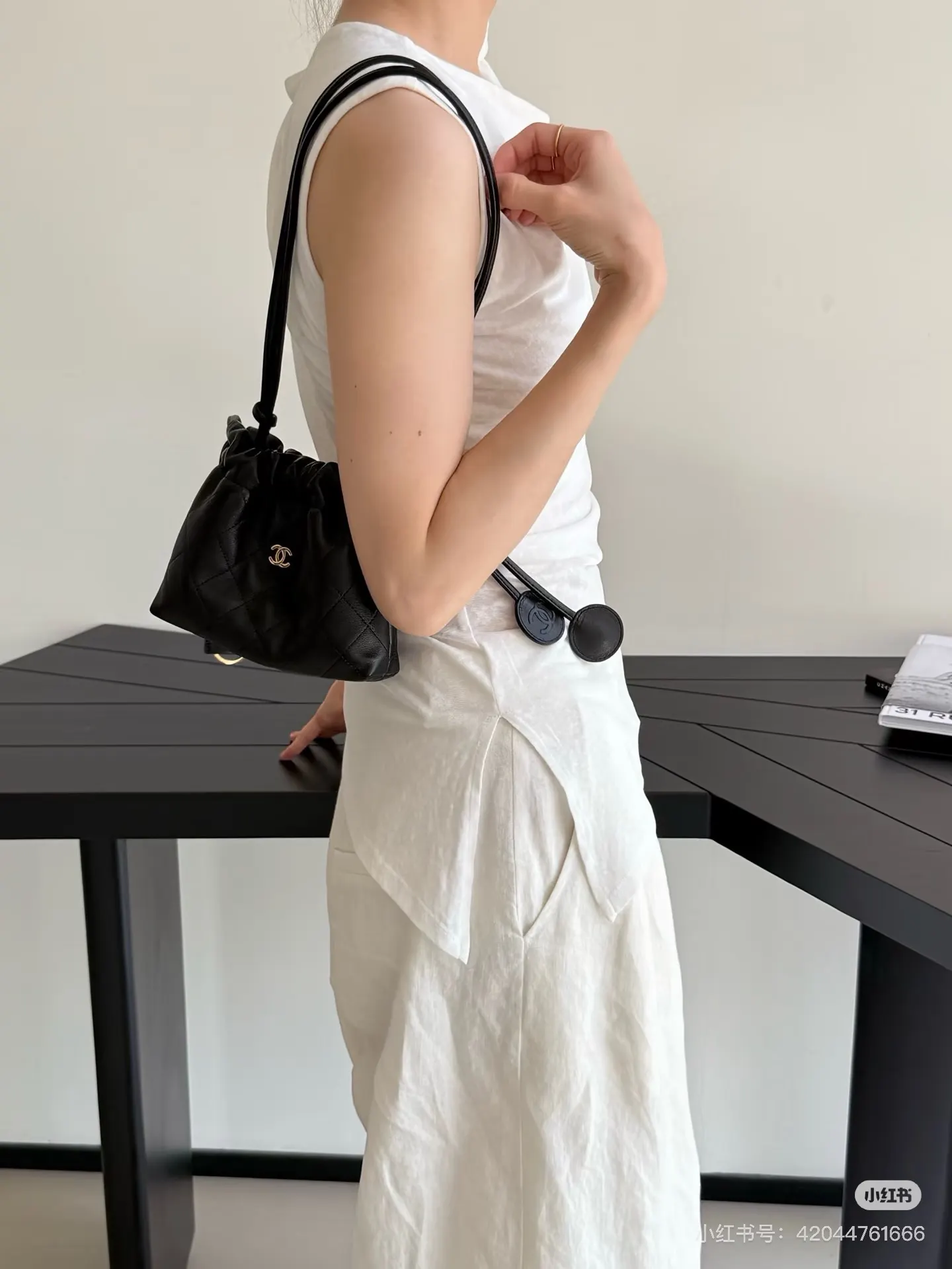 Chanel Quilted Drawstring Bucket Bag D37018279 — view 13