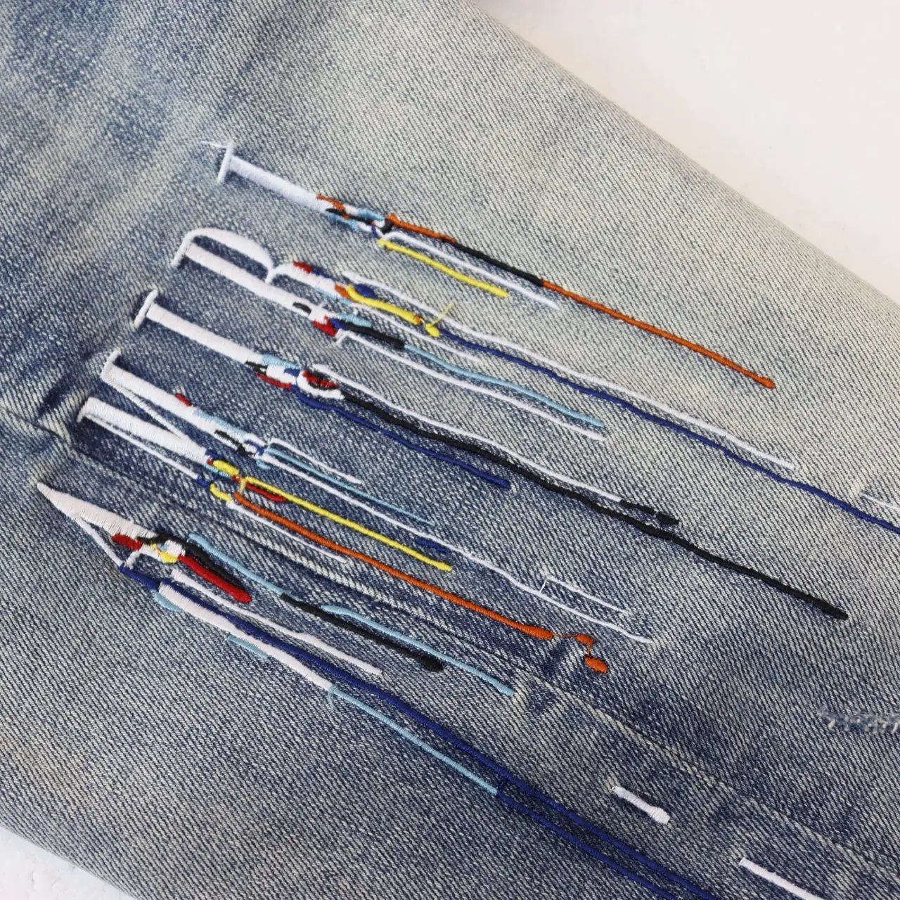 Distressed Slim-Fit Embroidered Jeans D13811848 — view 5