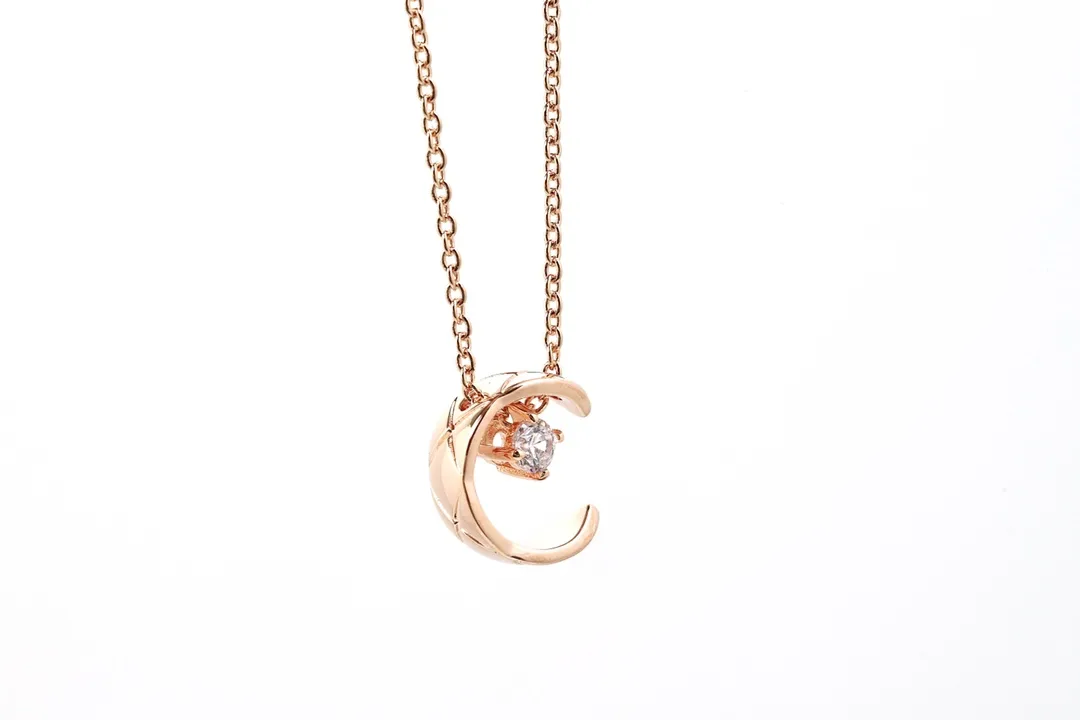 Quilted Crescent Moon Pendant Necklace with Crystal D11016656