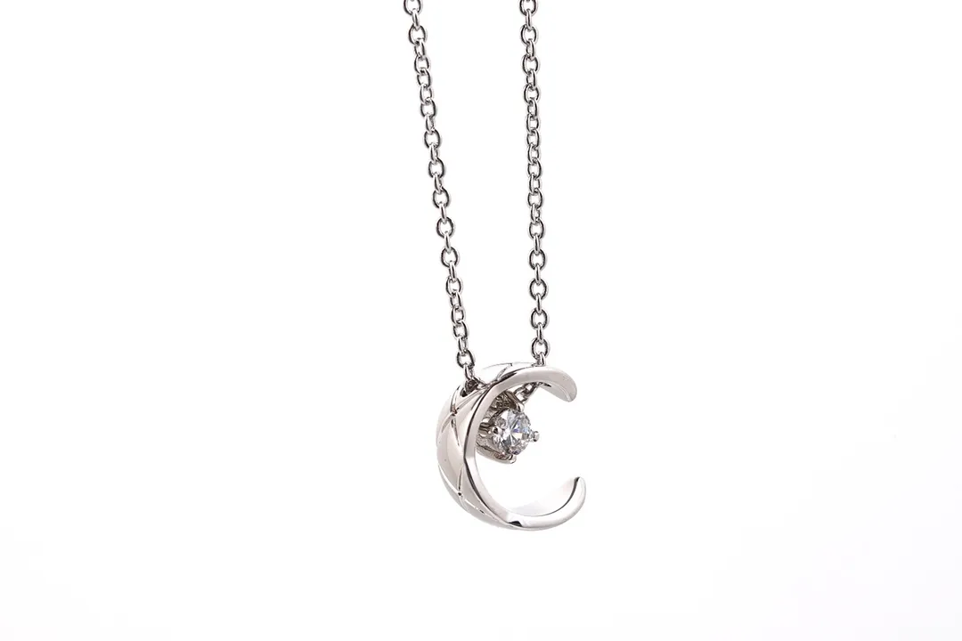 Quilted Crescent Moon Pendant Necklace D11016654