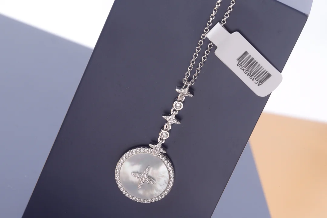 APM Monaco Star and Mother-of-Pearl Pendant Necklace (Sterling Silver) D29516572 — view 3