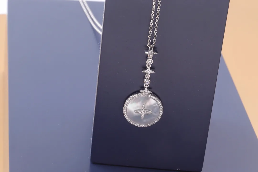APM Monaco Star and Mother-of-Pearl Pendant Necklace (Sterling Silver) D29516572 — view 7