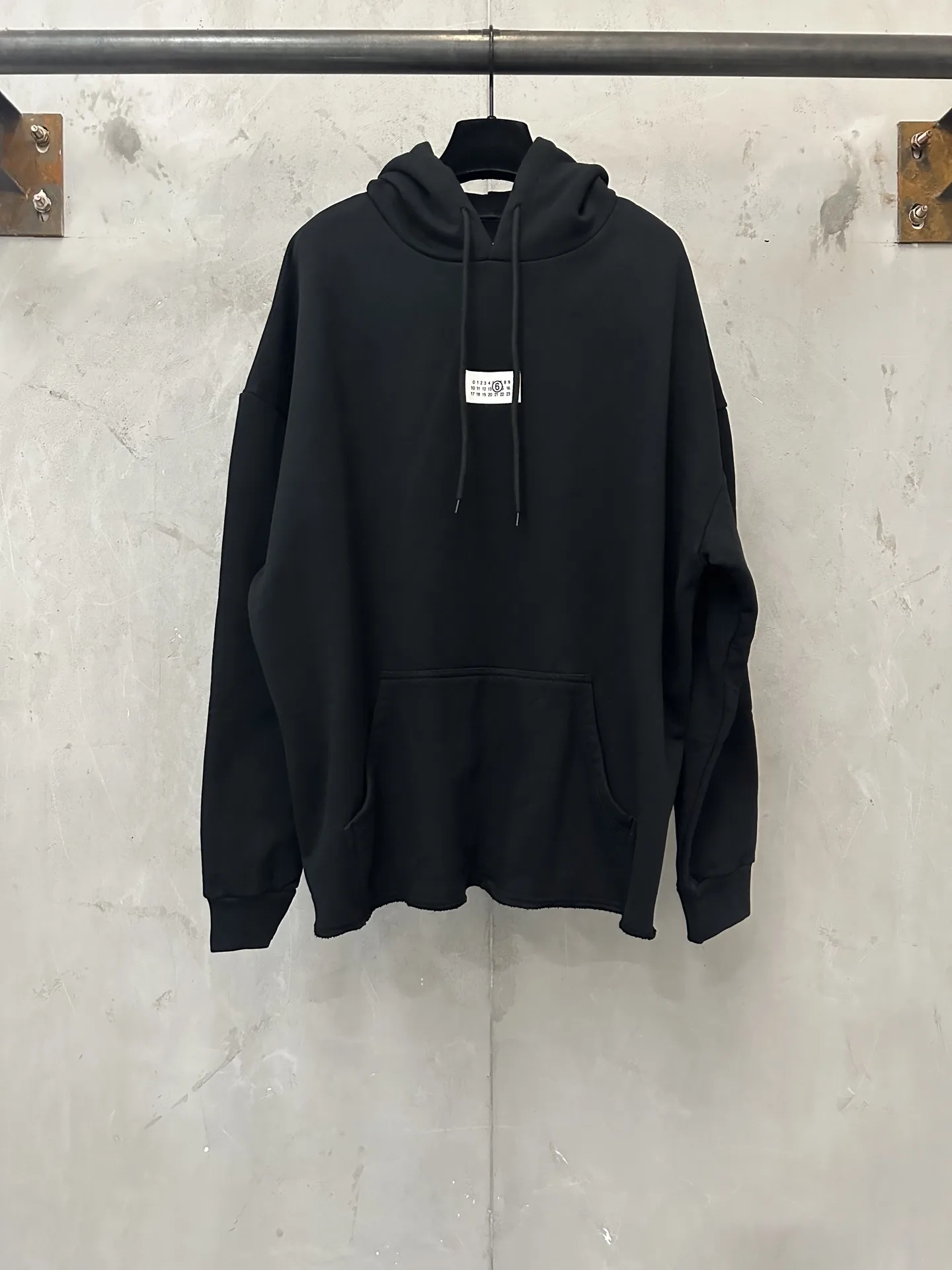 MM6 Logo Patch Distressed Hem Hoodie D27020518