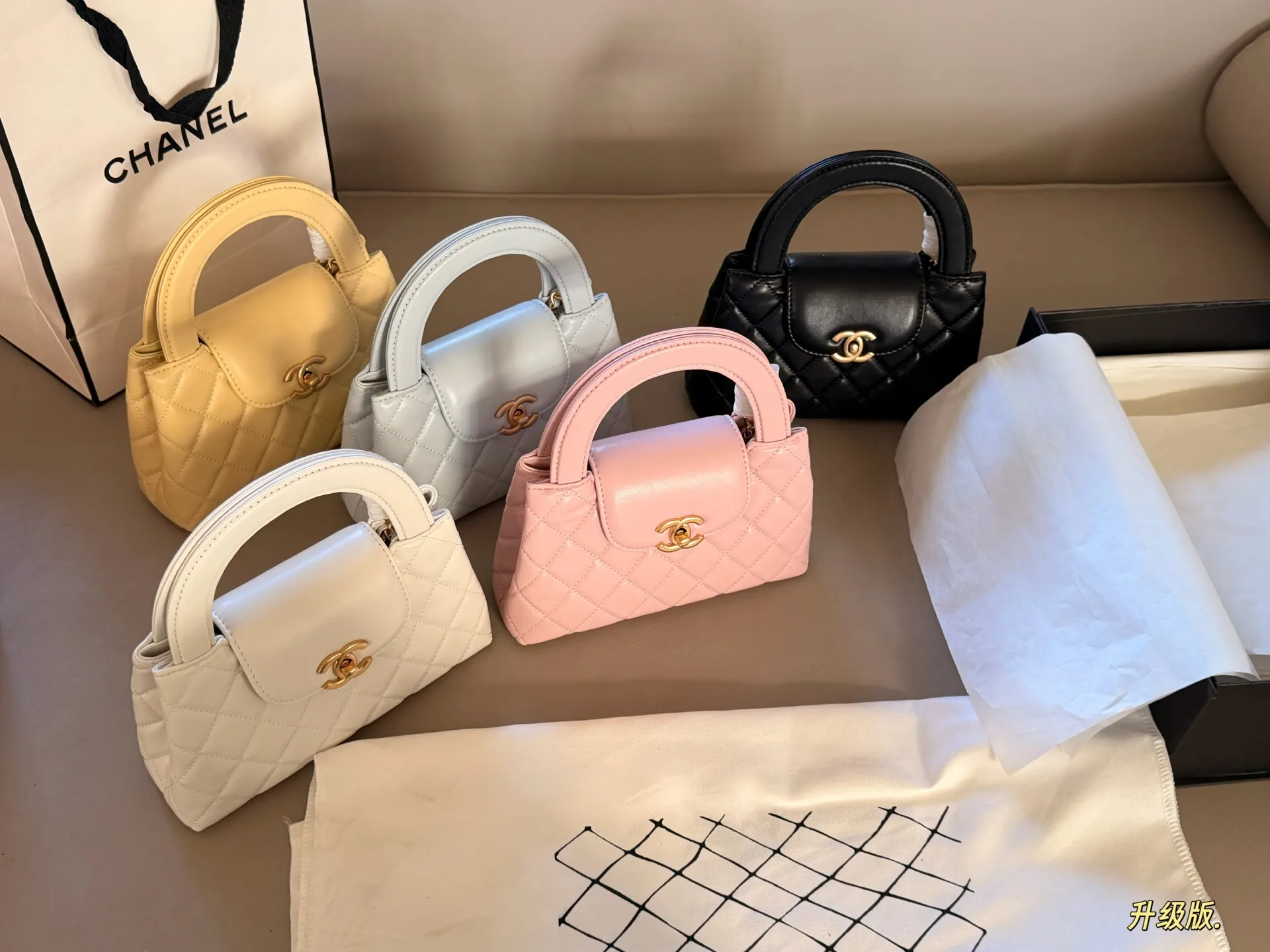 Quilted Leather Top-Handle Mini Bag D28018113