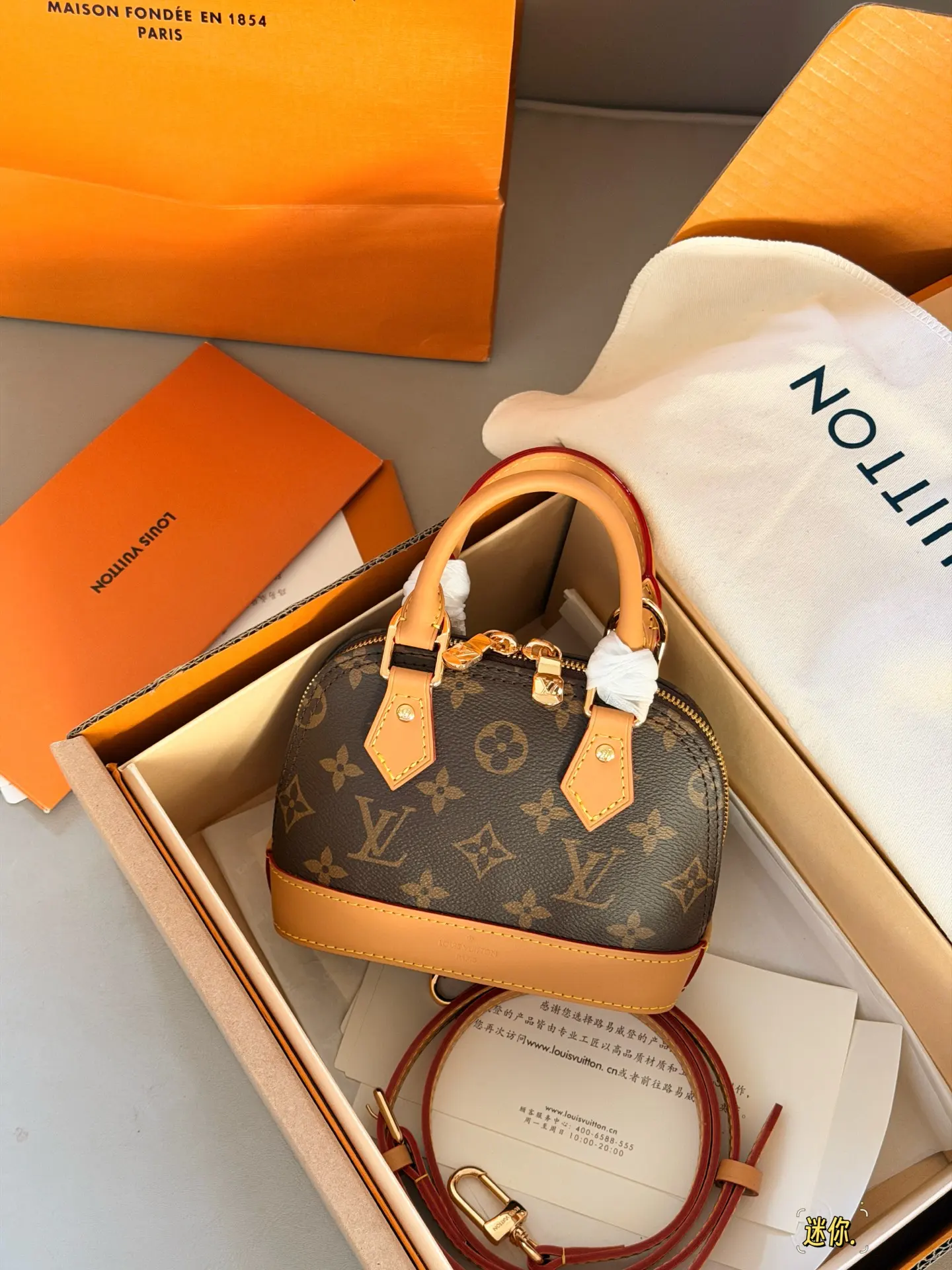 Alma Nano Monogram Top-Handle Bag D30018150 — view 2