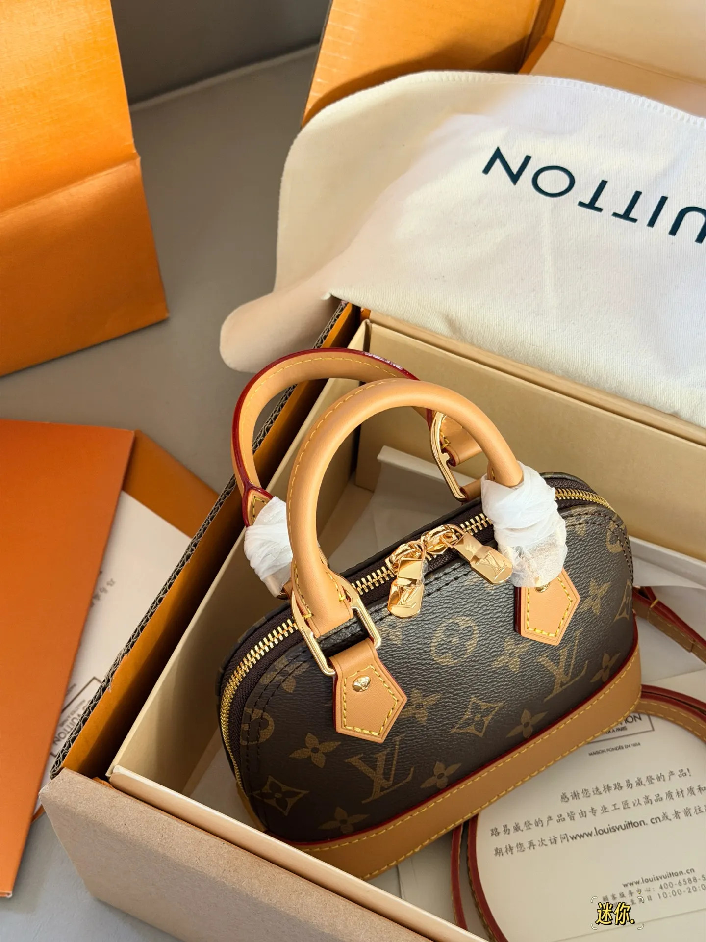 Alma Nano Monogram Top-Handle Bag D30018150 — view 7