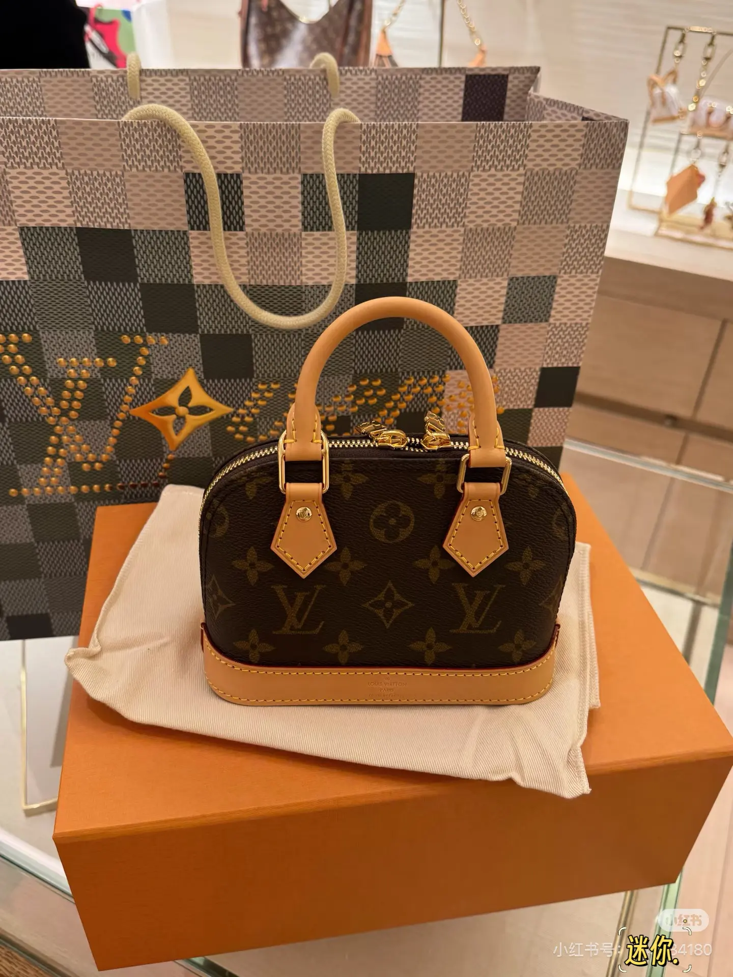 Alma Nano Monogram Top-Handle Bag D30018150 — view 10