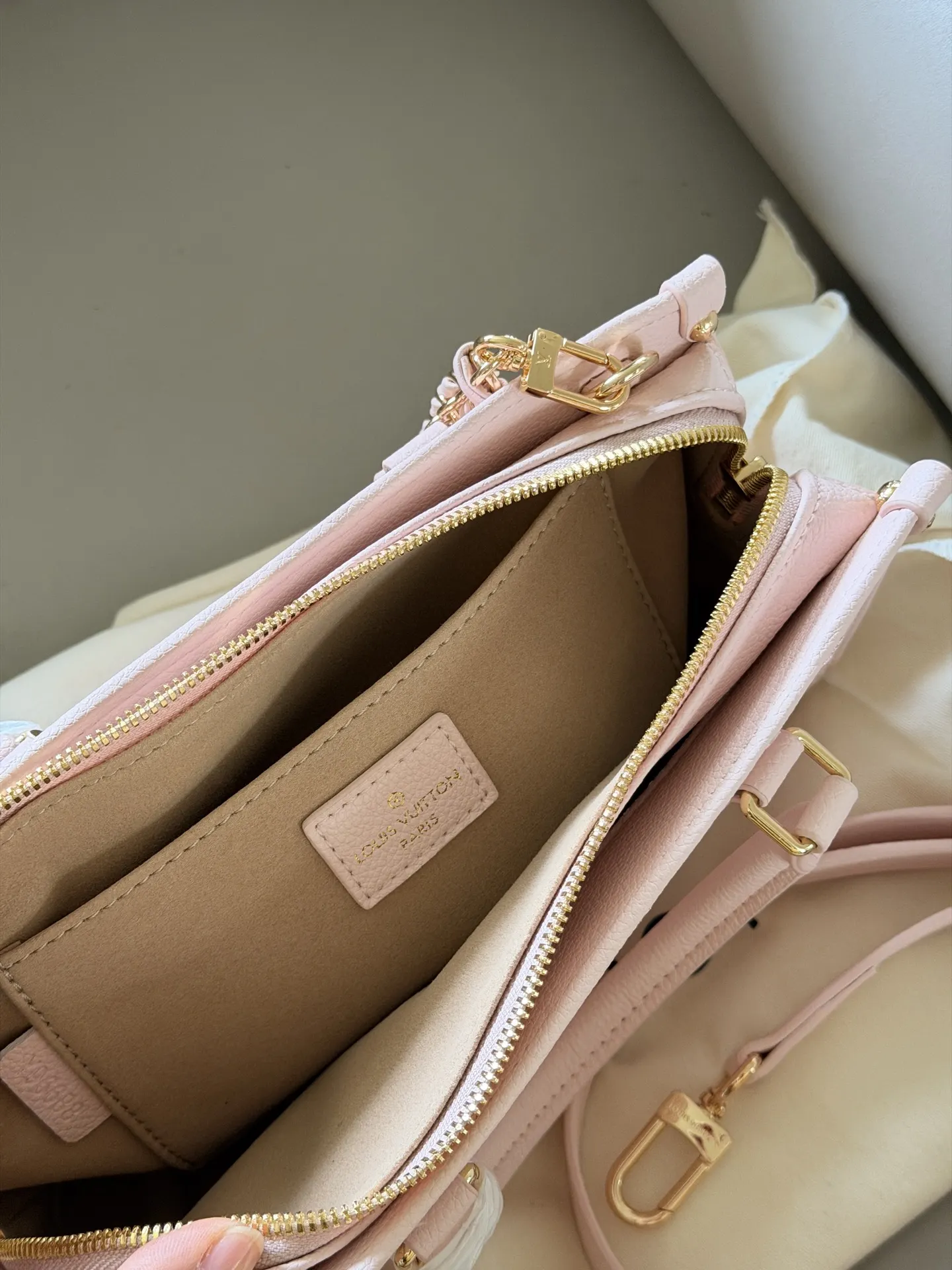 OnTheGo East West Monogram Empreinte Bag D32018072 — view 9