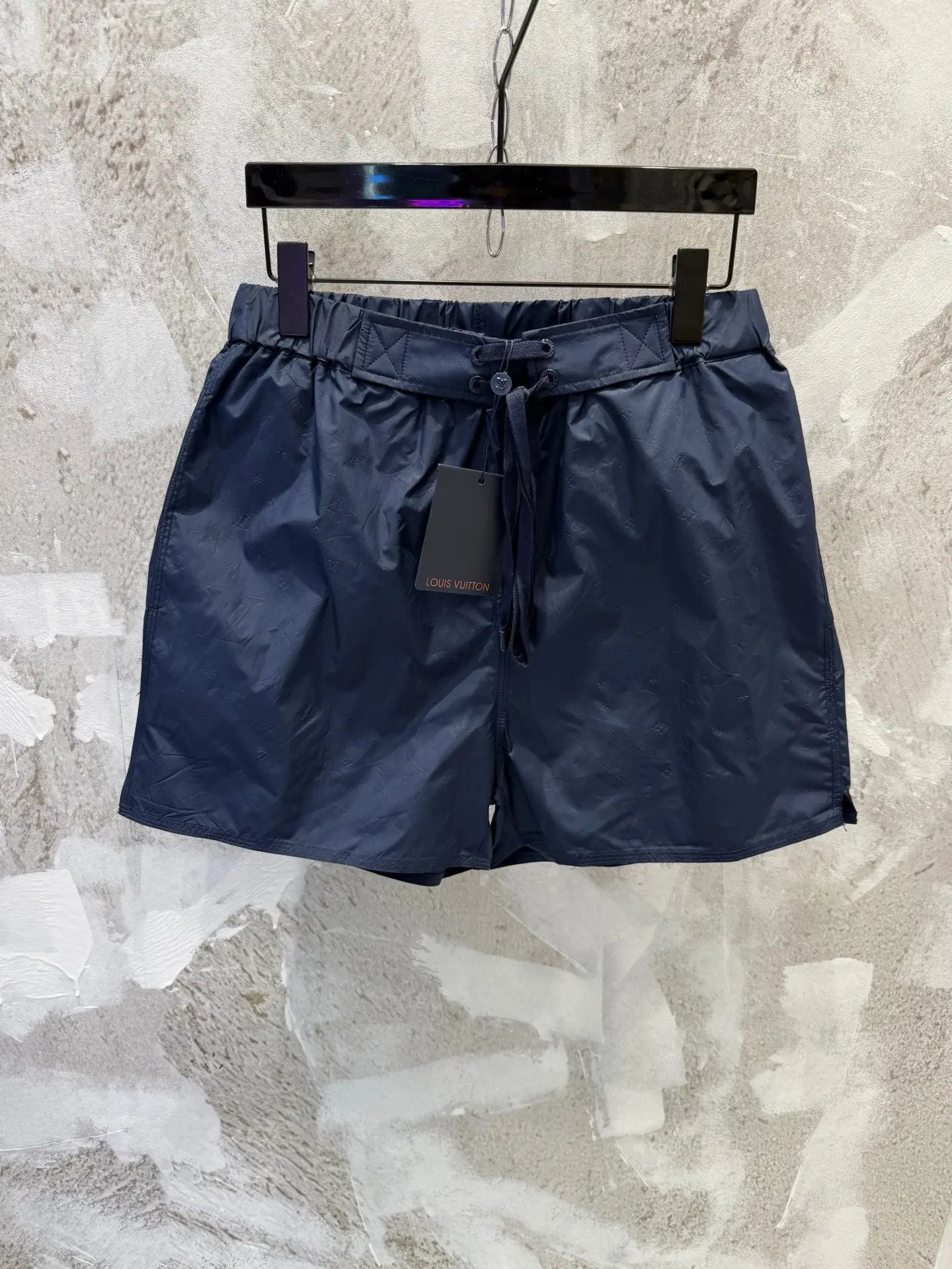 Monogram Embossed Swim Shorts D19012953