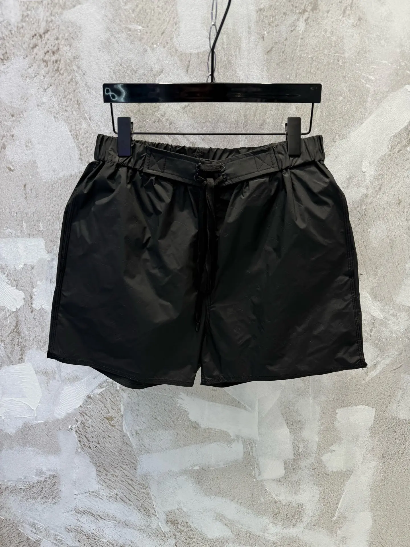 Monogram Embossed Swim Shorts D19012954