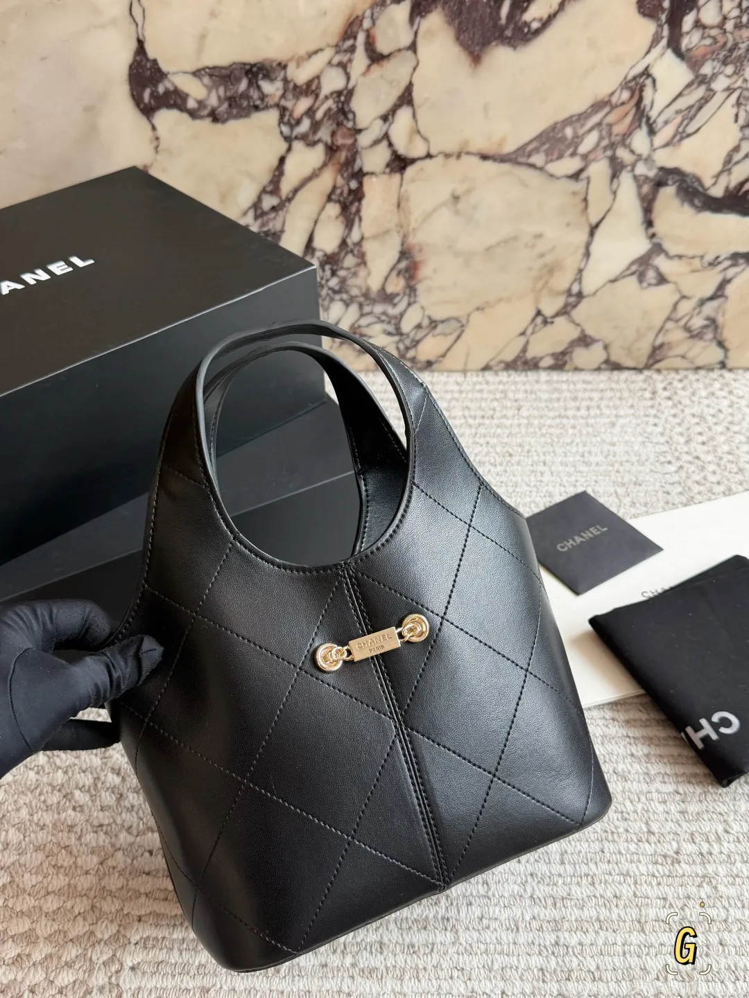Chanel 26P Quilted Leather Bucket Bag D28518504 — view 3