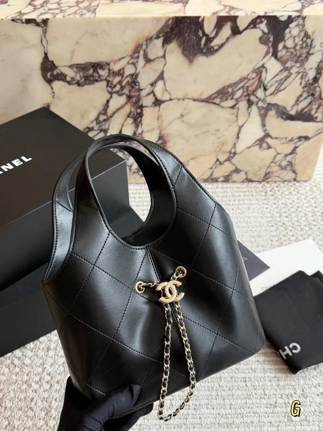 Chanel 26P Quilted Leather Bucket Bag D28518504 — view 7