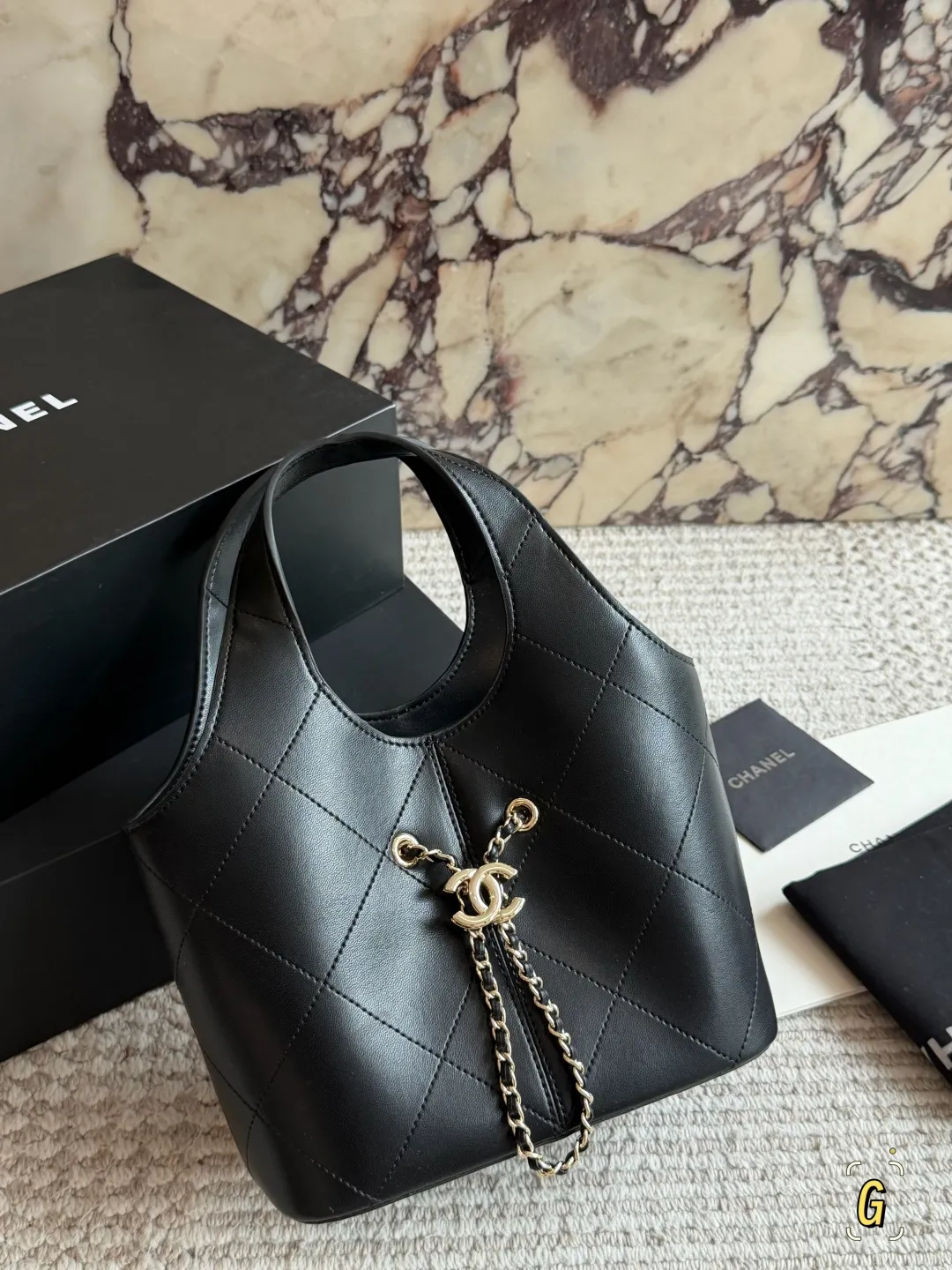 Chanel 26P Quilted Leather Bucket Bag D28518504 — view 9