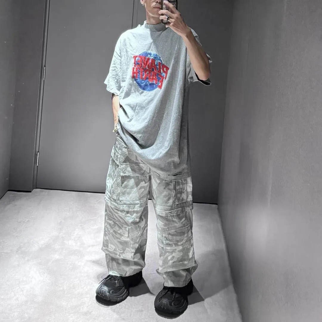 Balenciaga Hand-Painted Camouflage Cargo Trousers D23520547 — view 11
