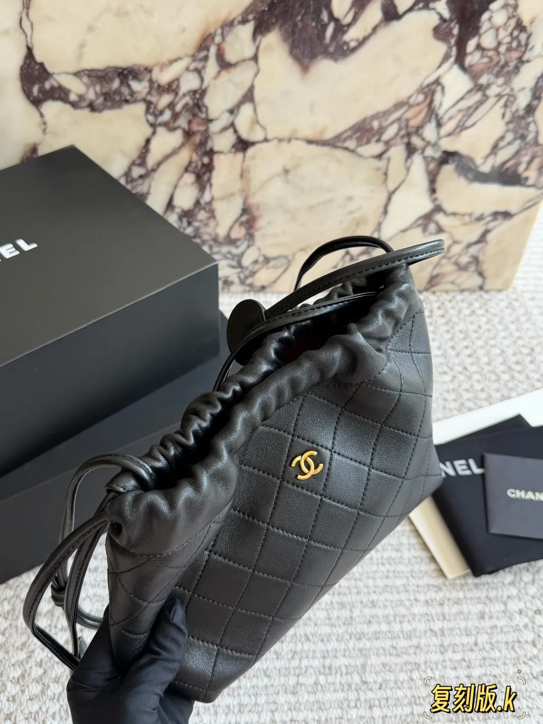 Chanel 26S Quilted Lambskin Drawstring Bucket Bag D34018085 — view 2
