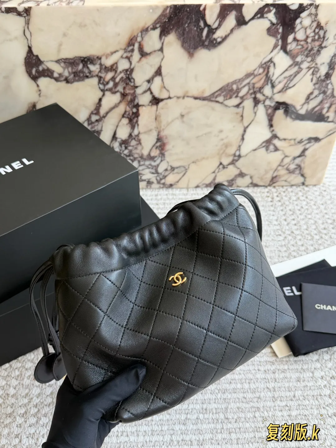 Chanel 26S Quilted Lambskin Drawstring Bucket Bag D34018085 — view 4