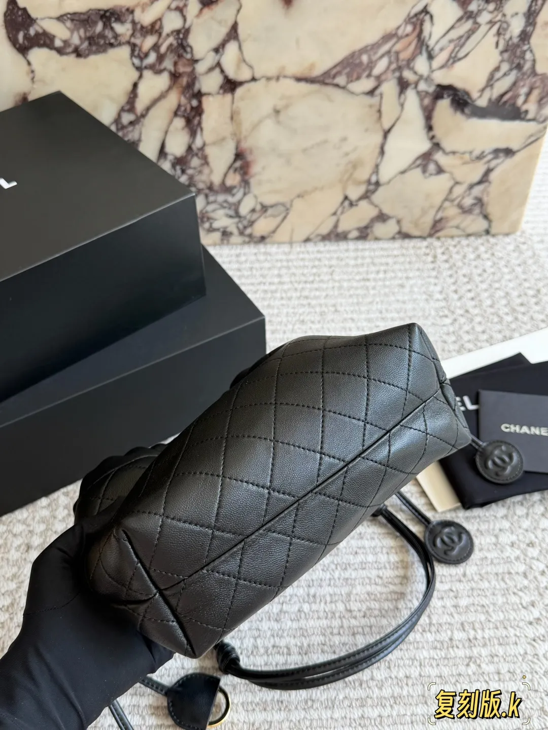 Chanel 26S Quilted Lambskin Drawstring Bucket Bag D34018085 — view 5