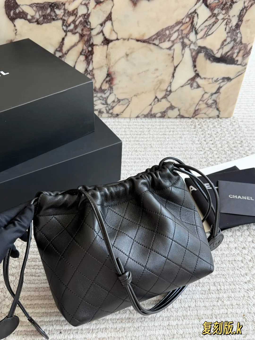 Chanel 26S Quilted Lambskin Drawstring Bucket Bag D34018085 — view 6