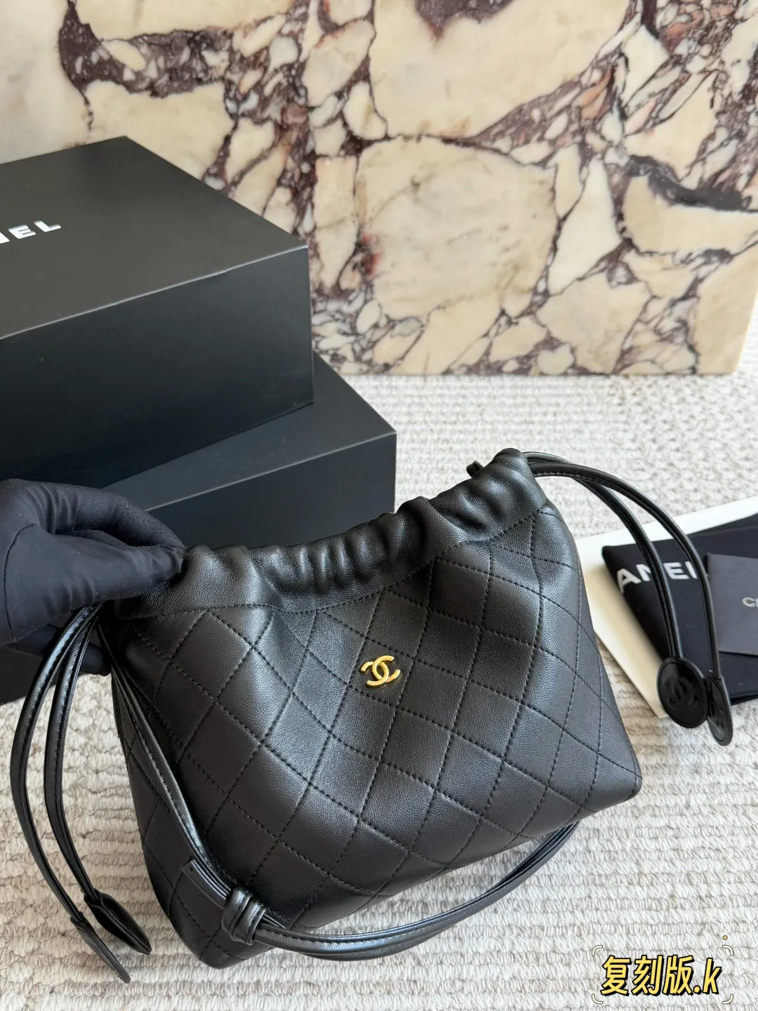 Chanel 26S Quilted Lambskin Drawstring Bucket Bag D34018085 — view 7
