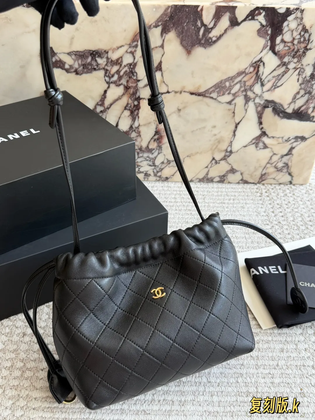 Quilted Lambskin Drawstring Bucket Bag D34018086