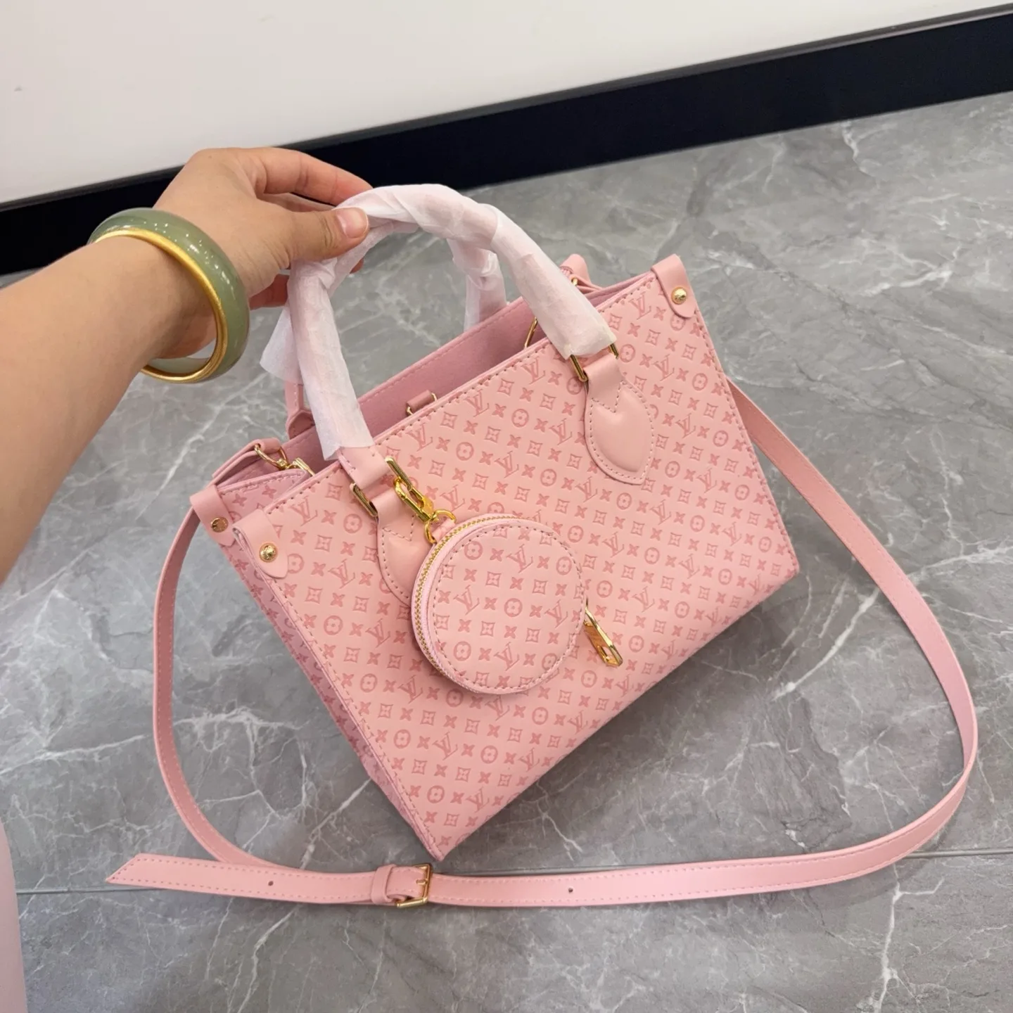 LV OnTheGo Embossed Pink Tote Bag D27516170