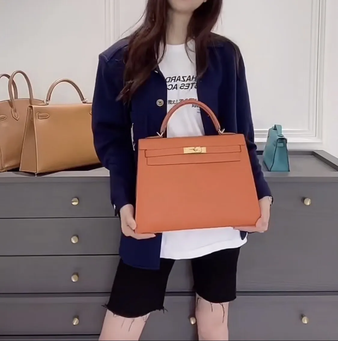 Hermès Kelly Orange Togo Leather Top-Handle Bag D59016192